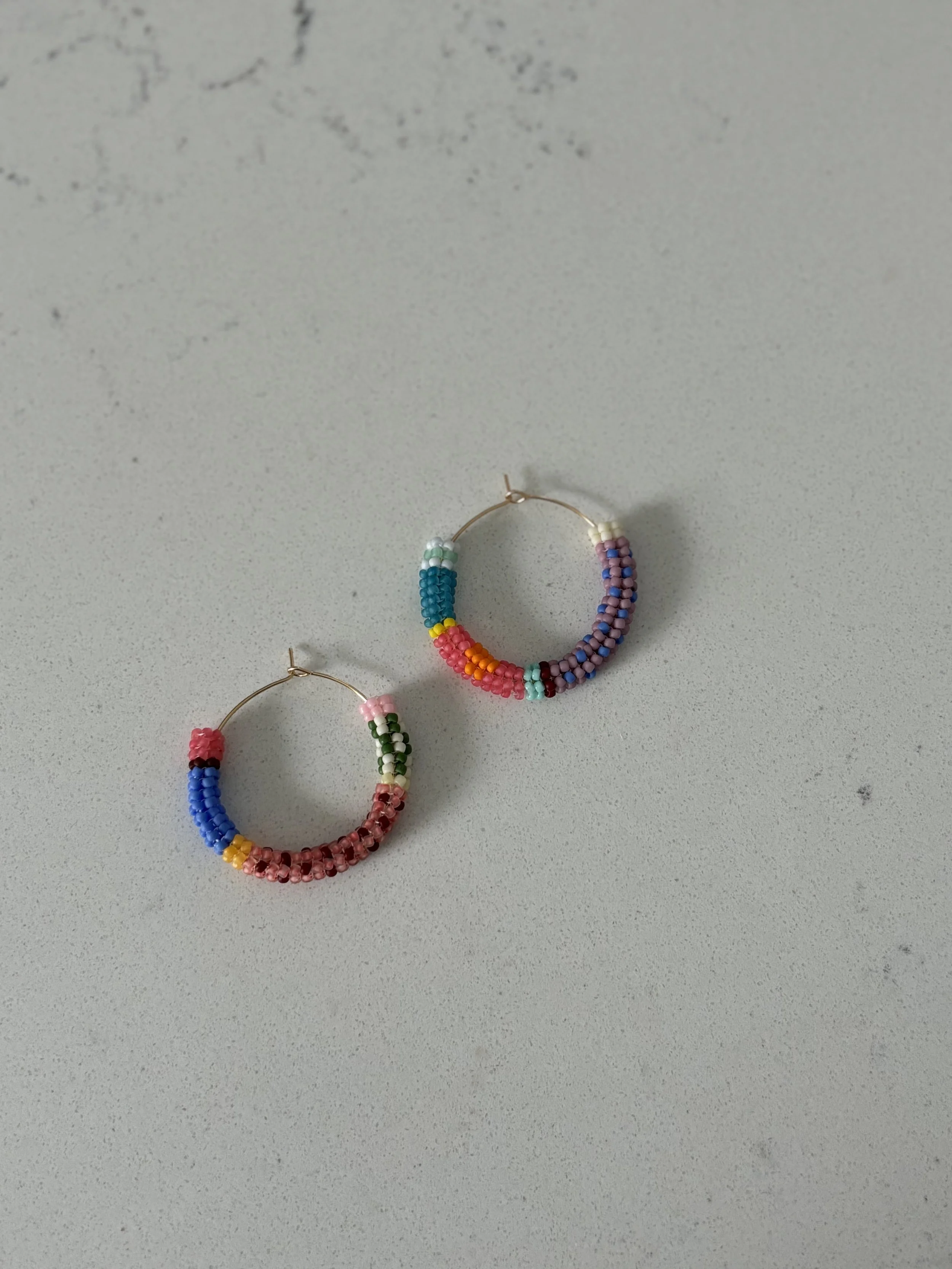 tapestry hoops: g