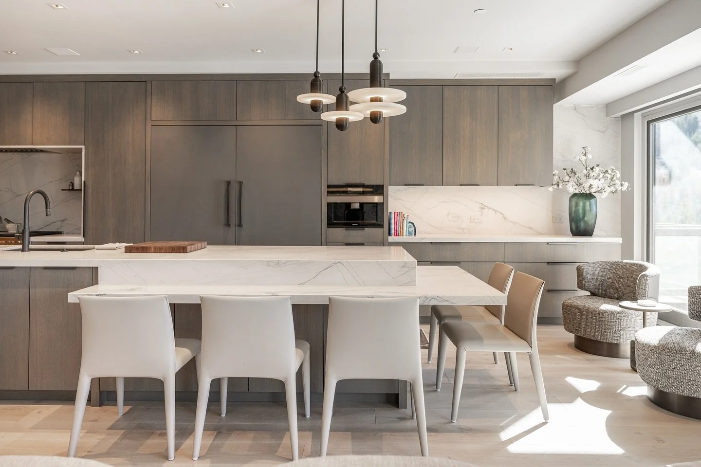 Possibly my favorite design decision of this kitchen was wrapping the fridge and freezer doors in leather. The unusual added texture to the kitchen was exactly what was needed.