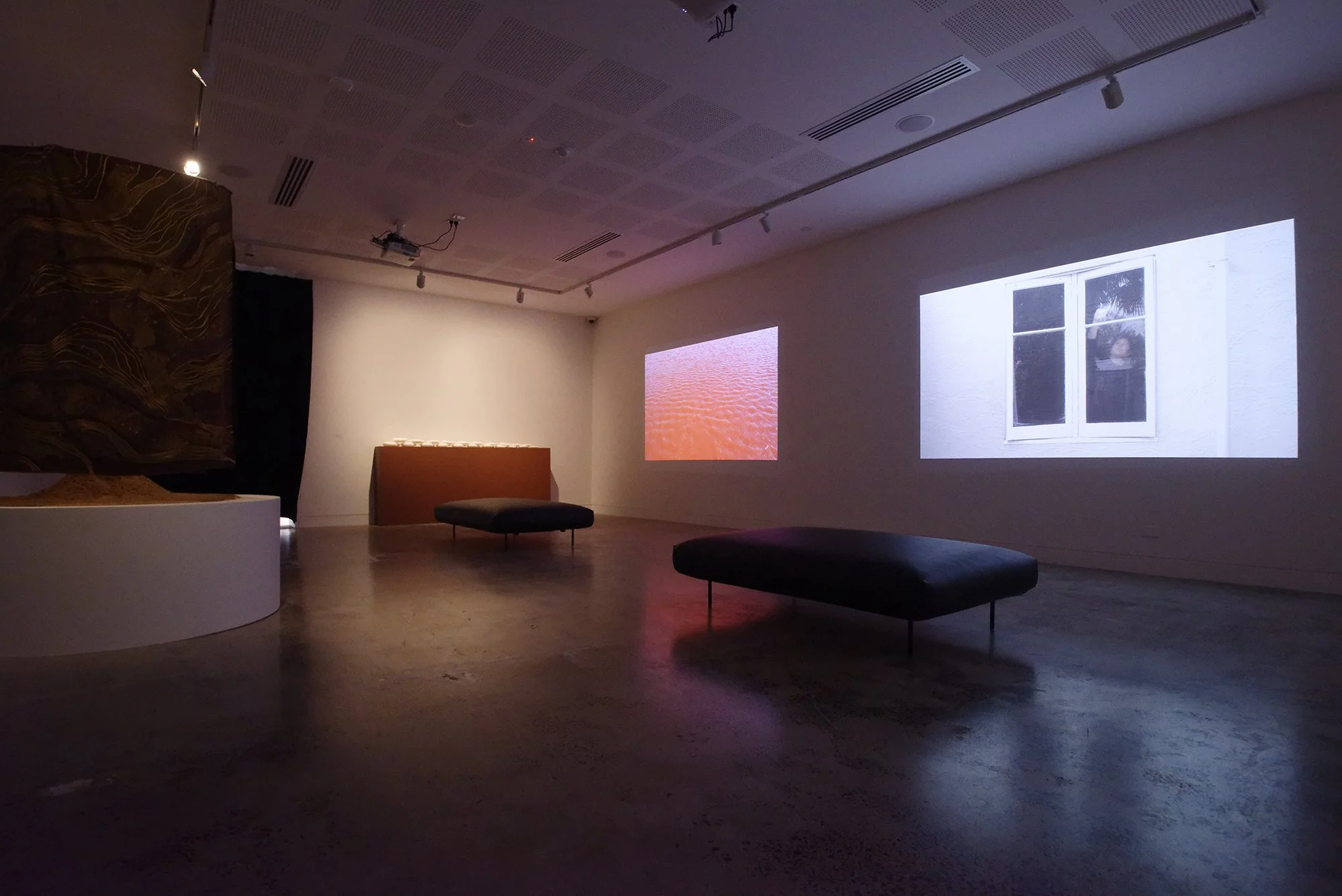 Group Exhibition: held by embracing droplets (installation view). Exhibited at Lismore Regional Gallery, 25 September 2026 - 31 January 2027. Photography by Cherie Winter.

Artists: Akil Ahamat, Leitu Bonnici, Kylie Caldwell, Country as Teacher, Buzz