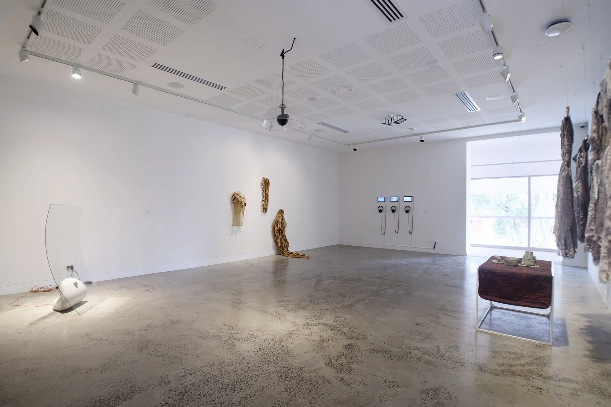 Group Exhibition: held by embracing droplets (installation view). Exhibited at Lismore Regional Gallery, 25 September 2026 - 31 January 2027. Photography by Cherie Winter.

Artists: Akil Ahamat, Leitu Bonnici, Kylie Caldwell, Country as Teacher, Buzz