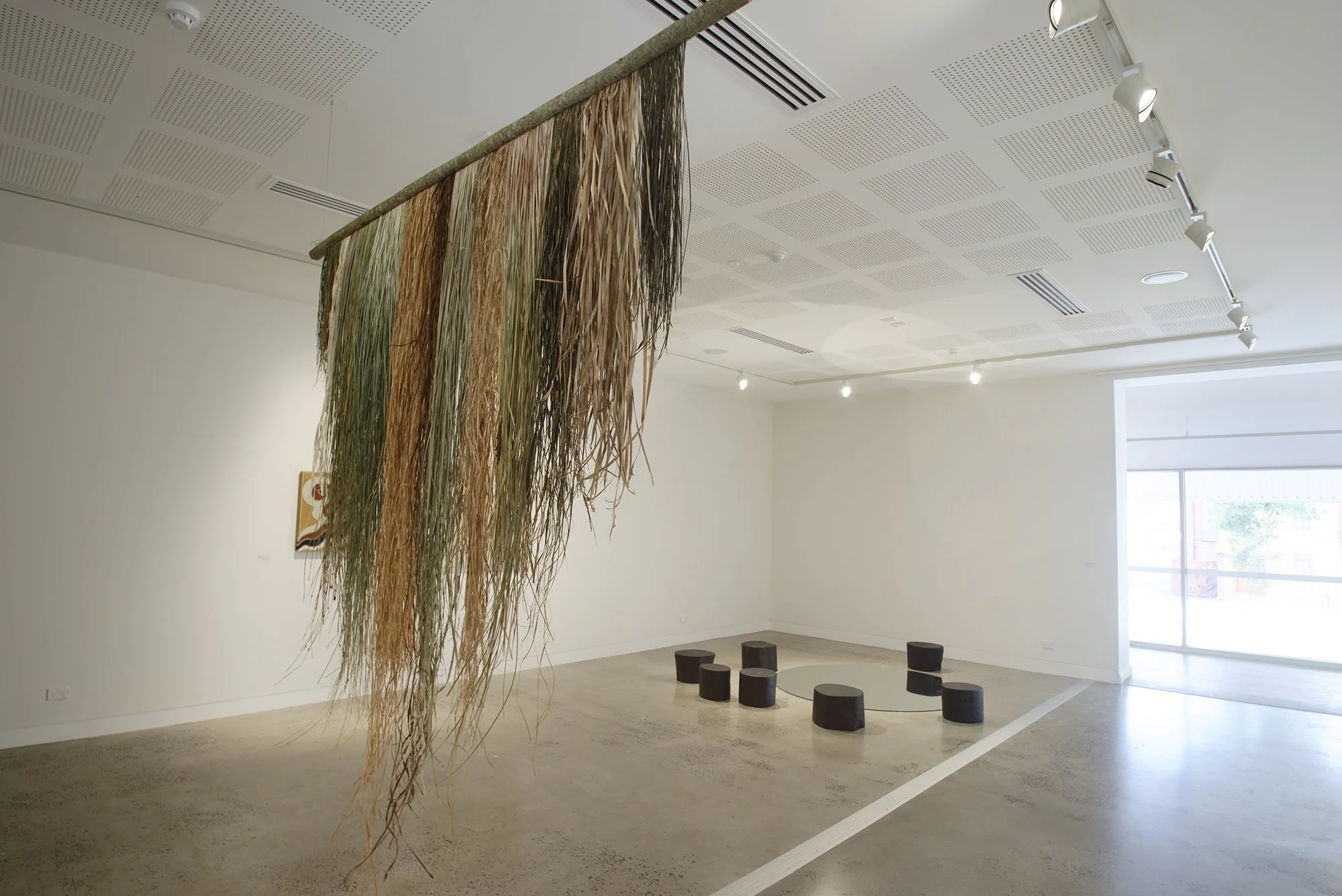 Group Exhibition: held by embracing droplets (installation view). Exhibited at Lismore Regional Gallery, 25 September 2026 - 31 January 2027. Photography by Cherie Winter.

Artists: Akil Ahamat, Leitu Bonnici, Kylie Caldwell, Country as Teacher, Buzz