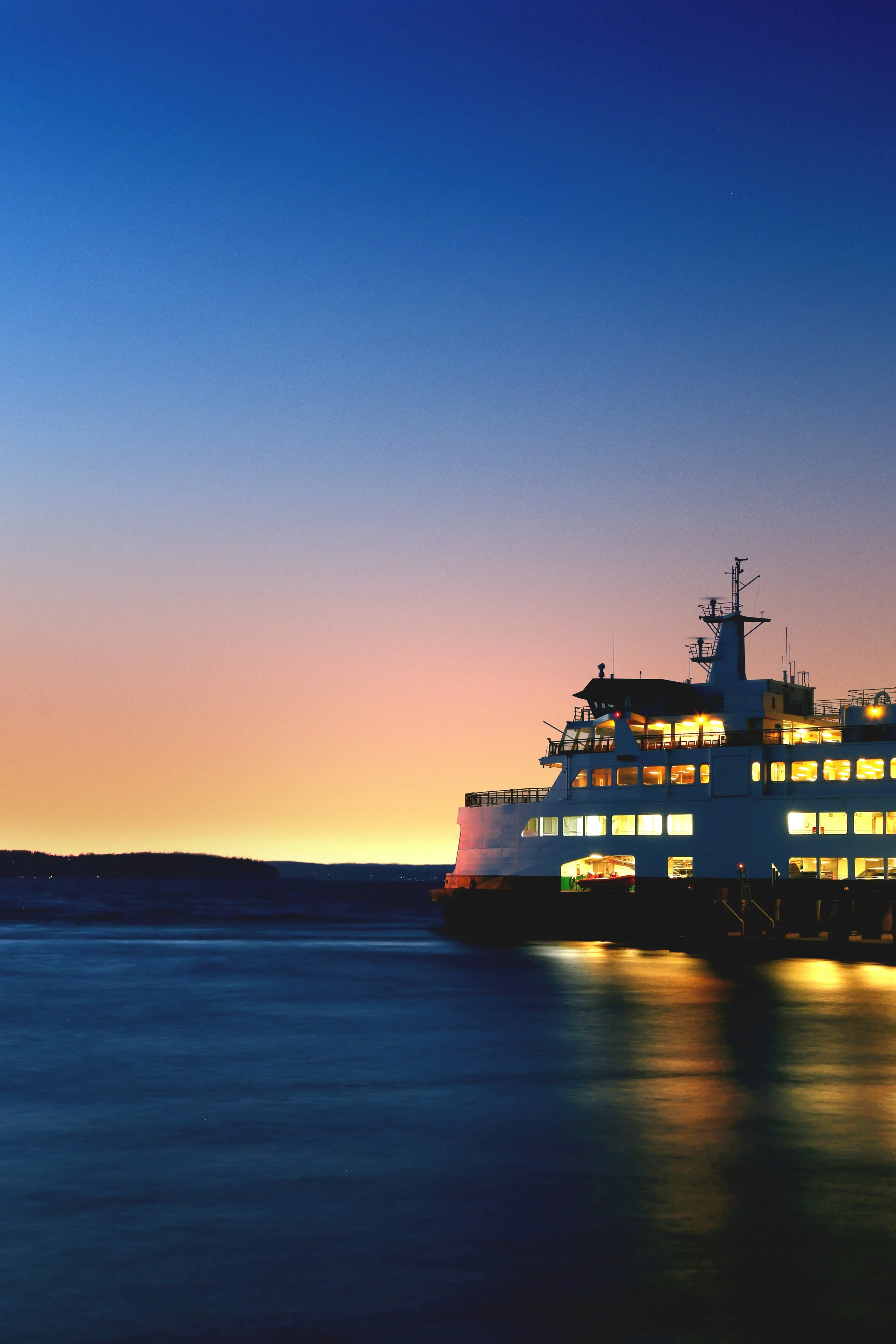Picture of a ferry boat at sunset.