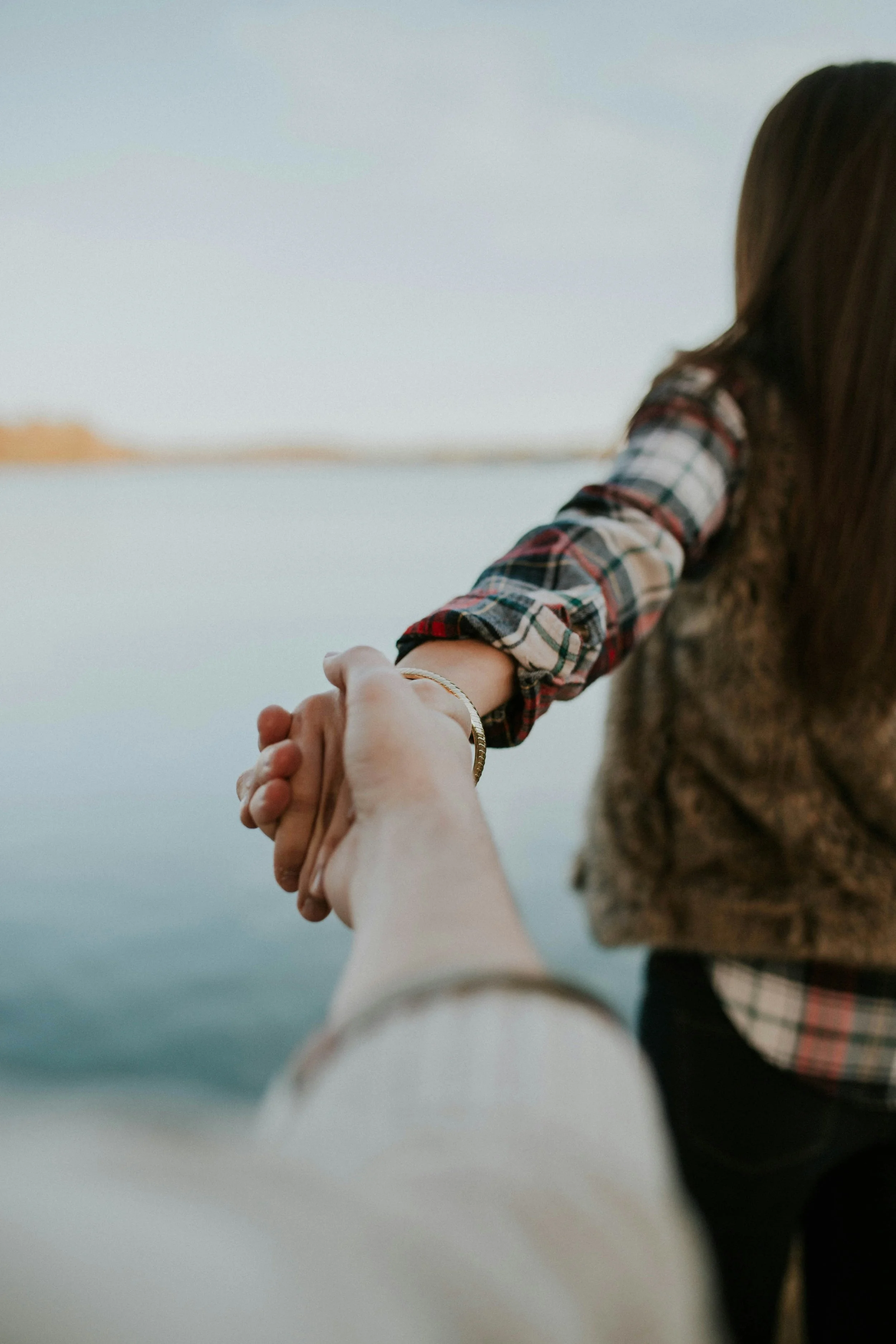 A couple holding hands because of EMDR therapy Seattle