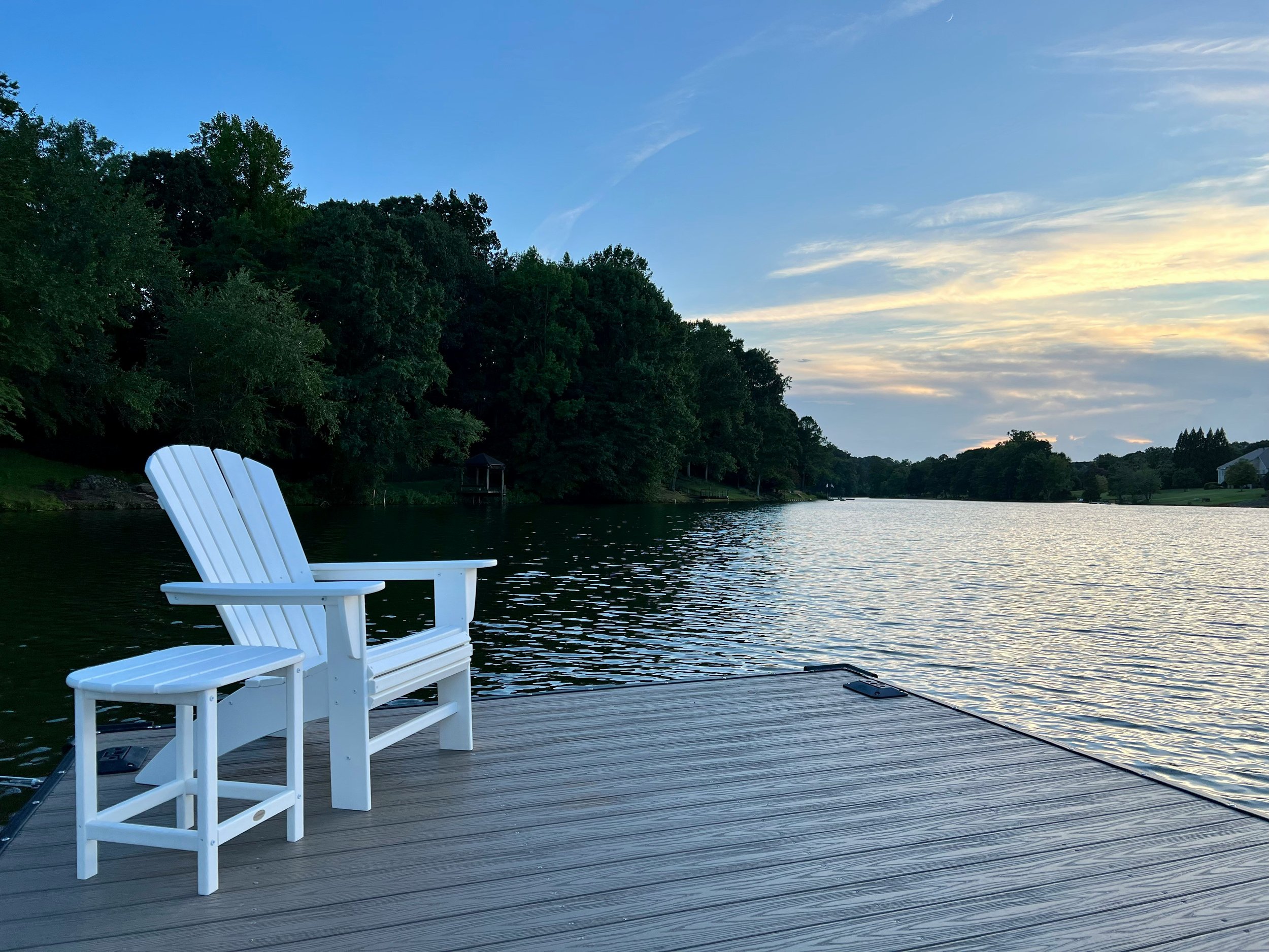 Single chair on a dock symbolizing recovery from grief with EMDR therapy Seattle.