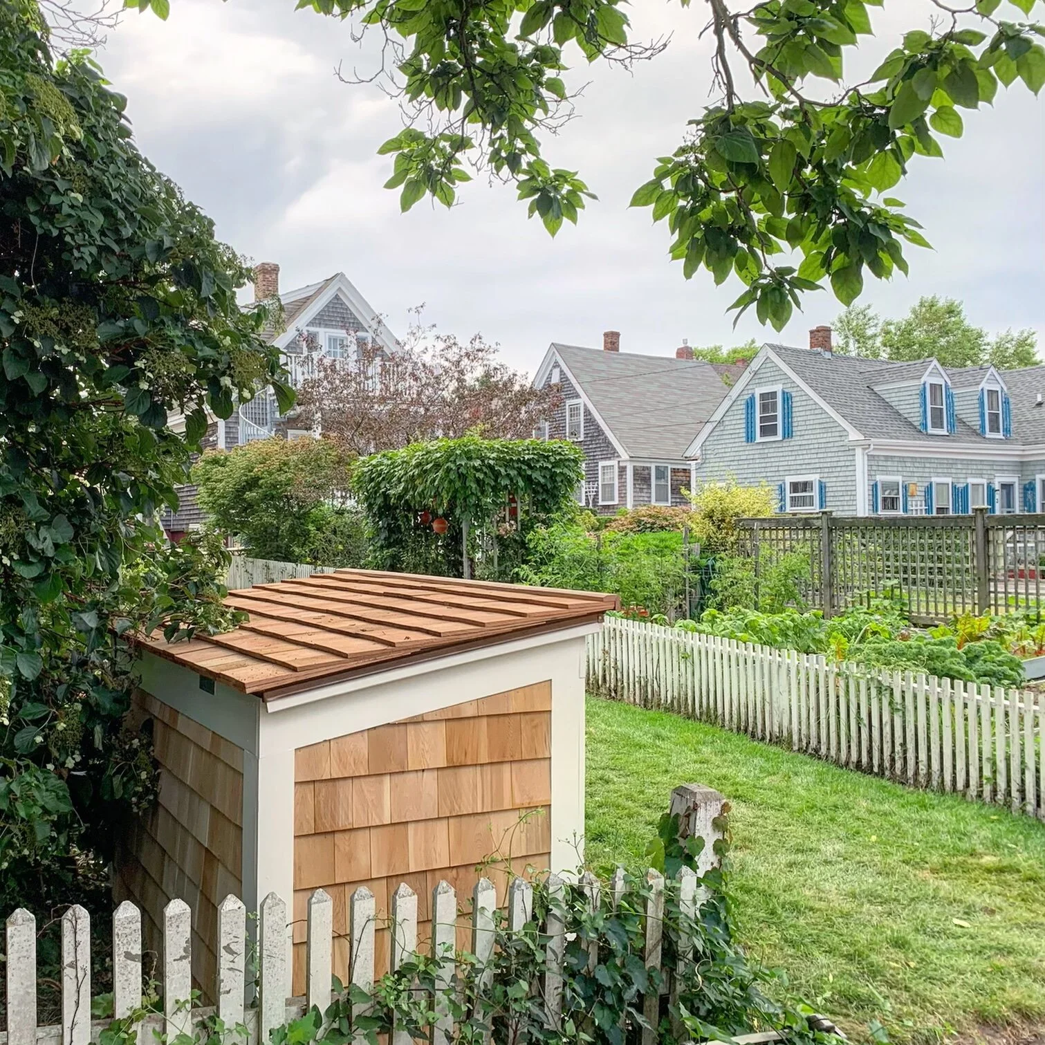 Trash Can Shed from wood reclaimed from original Cape Cod House