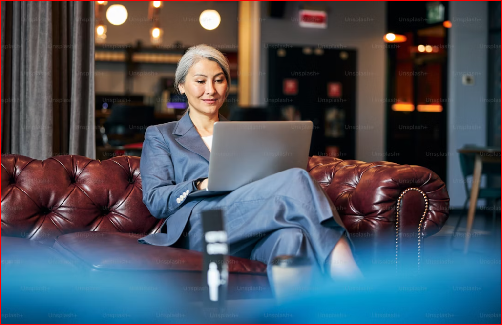 business woman middle aged laptop.png