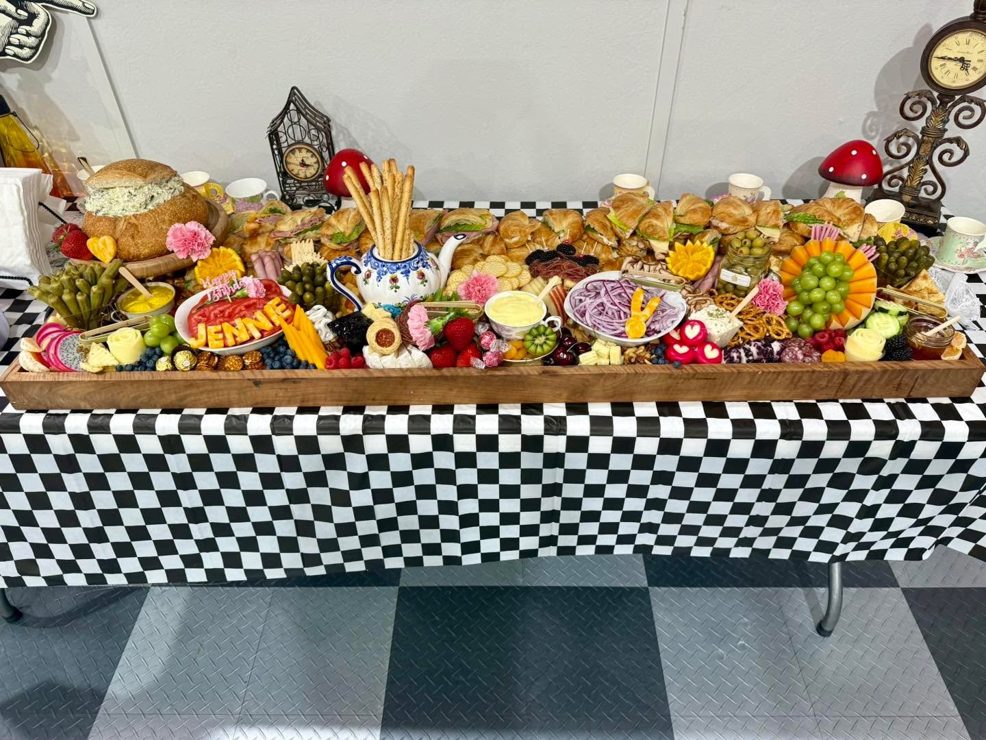 Come see us til 6:00 for all of your favorite snacks, dips, boards, cheeseballs, flavored crackers and SO MUCH MORE!! 🎉🎉🎉
Our GRAB & GO FRIDGES ARE STOCKED UP!!
In the meantime, check out this Alice in Wonderland themed board we created this