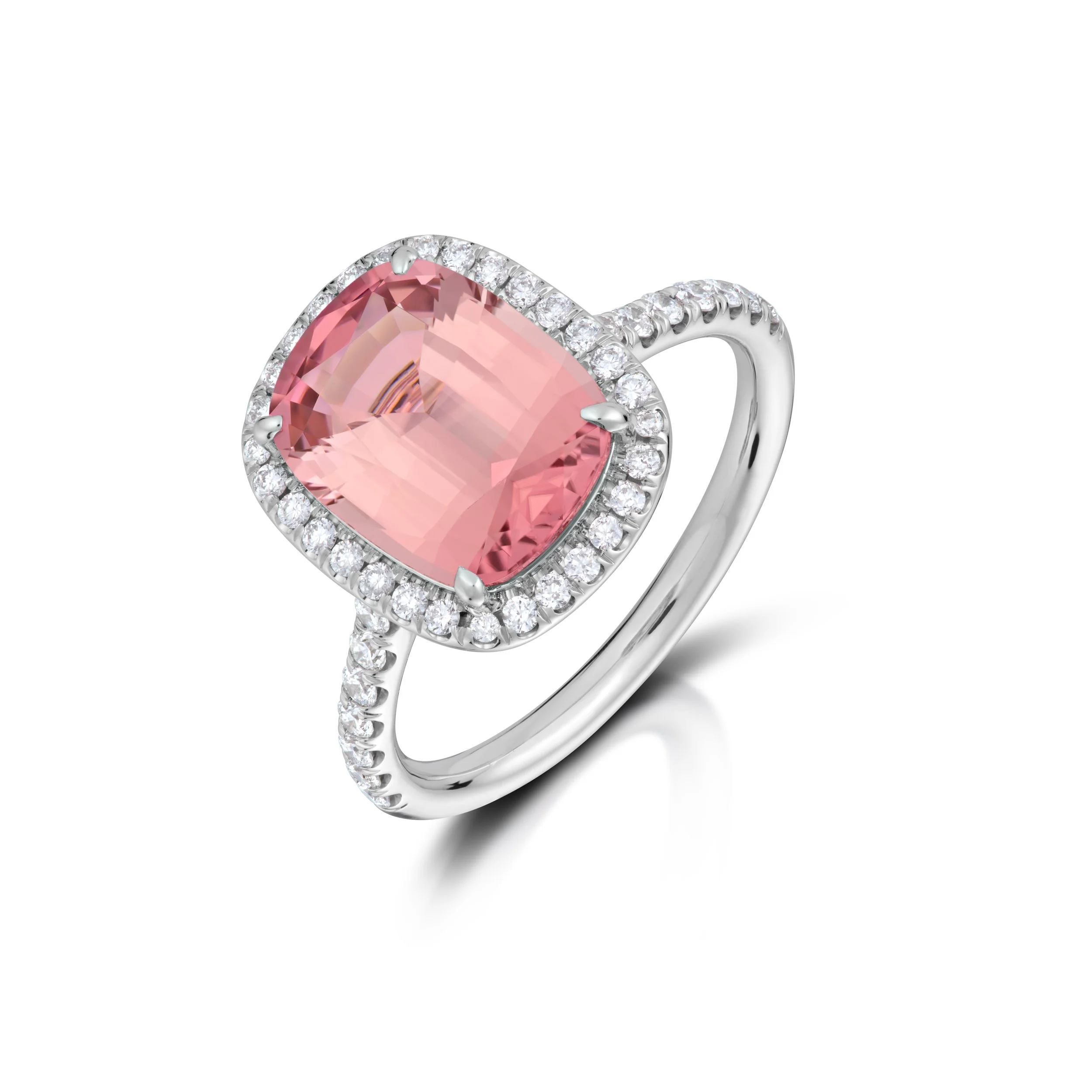 3.60 carat peach tourmaline and diamond ring set in 18 karat white gold. 