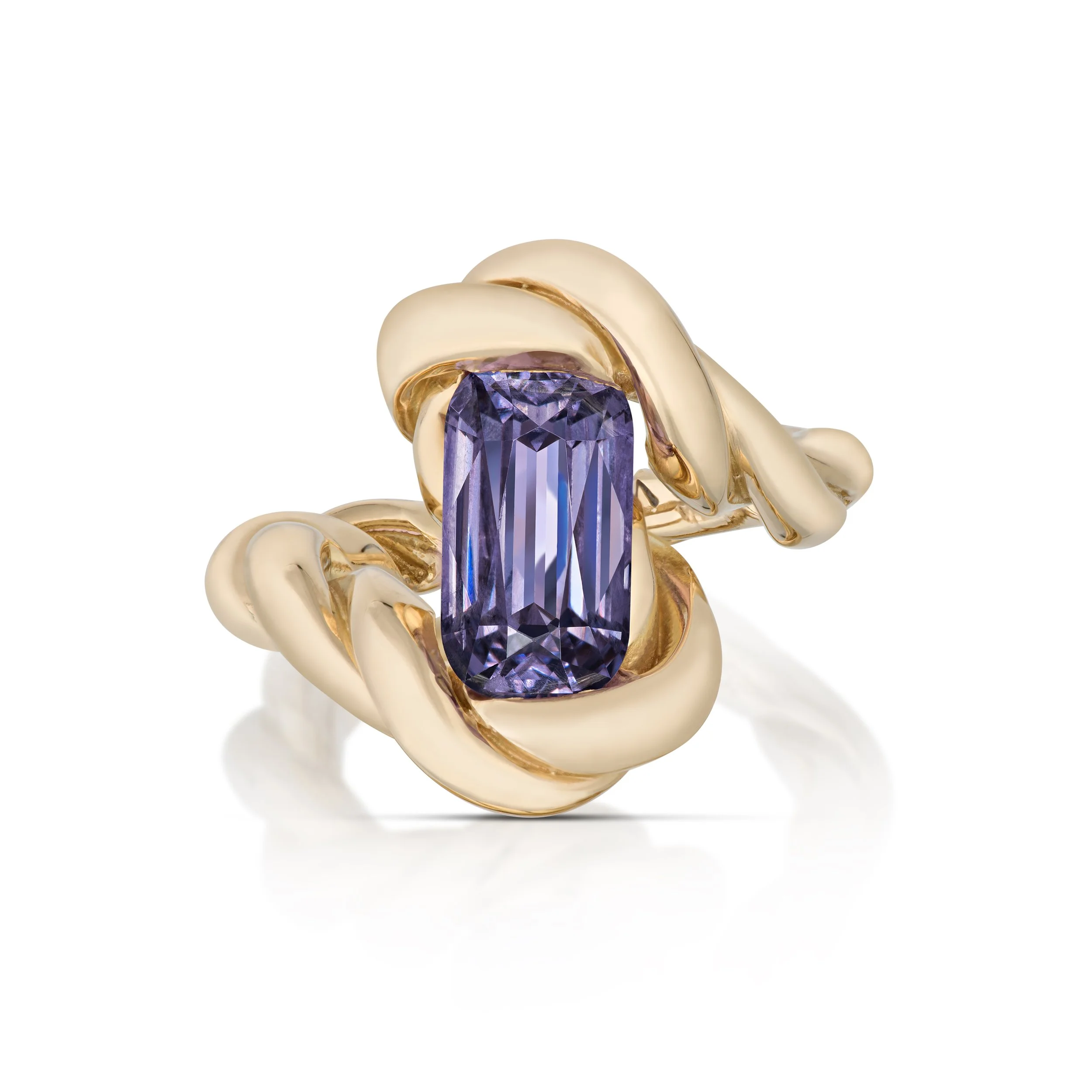 Purple Sapphire set into 18 karat yellow gold. Photographed by Jeff Mason
