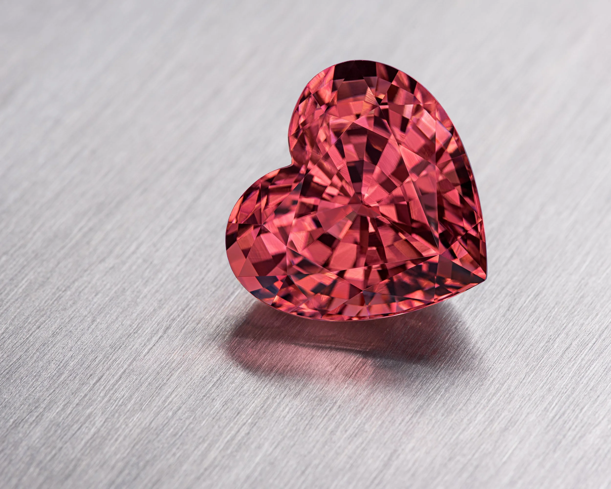 29.69ct_Peach_Tourmaline_Heart on brushed aluminum. 