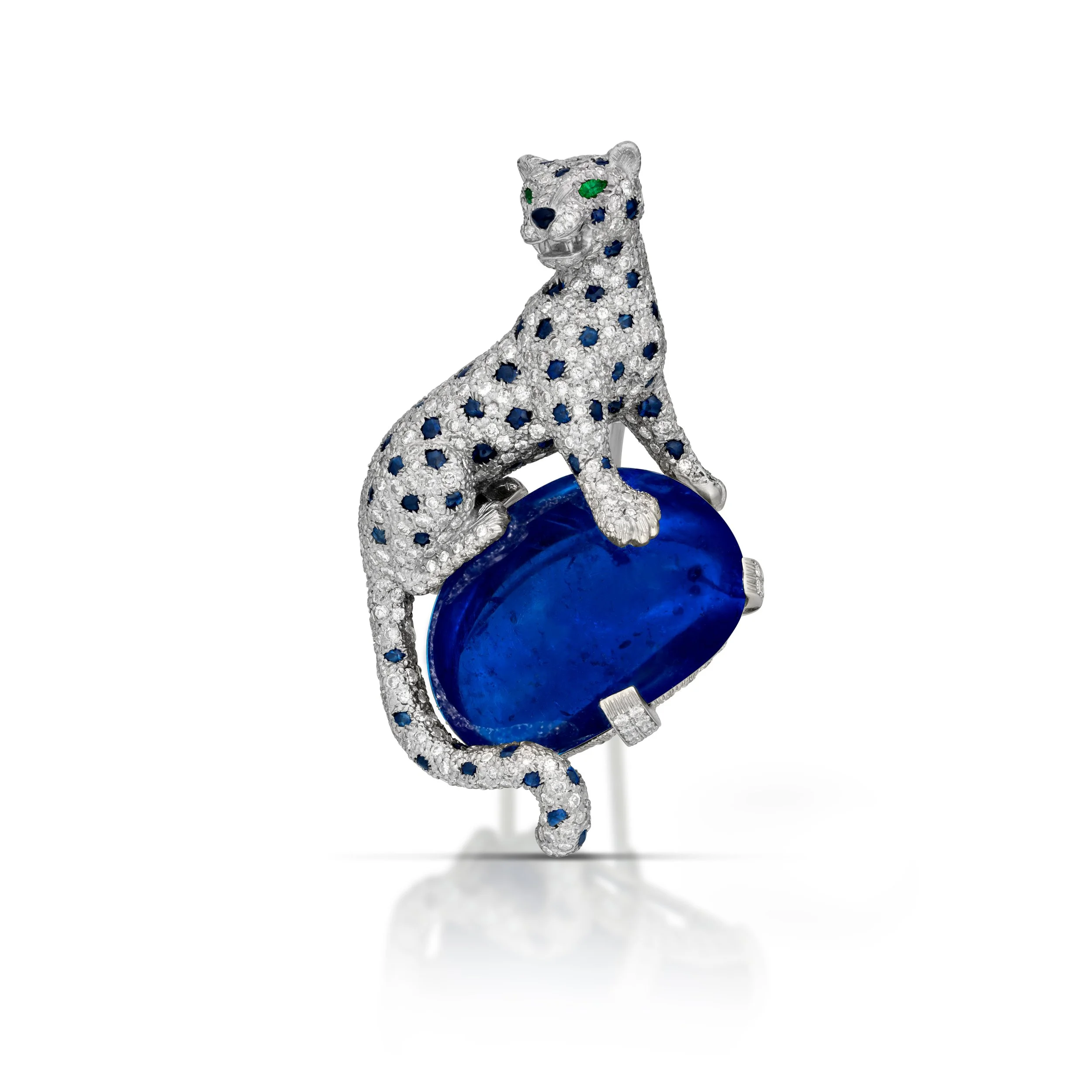 Vintage Cartier Jaguar Brooch with a Burma sapphire cabochon. 