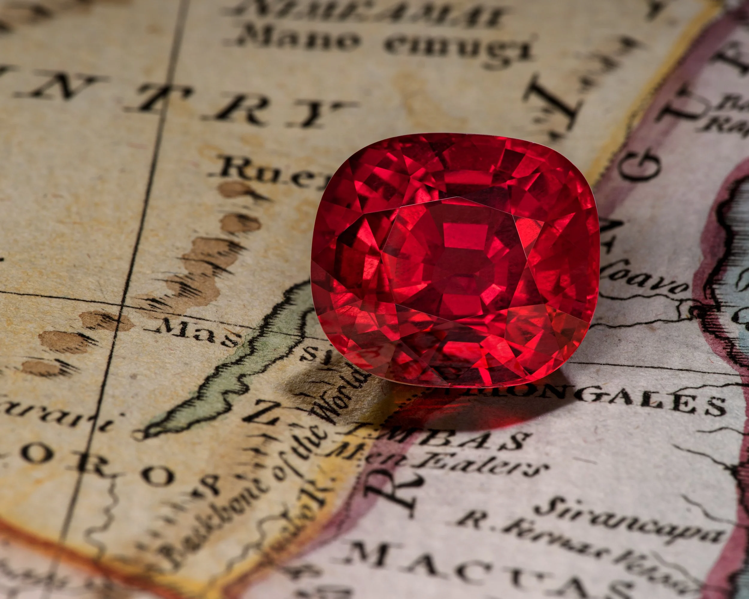 16.18 carat Mozambique Ruby on a map background