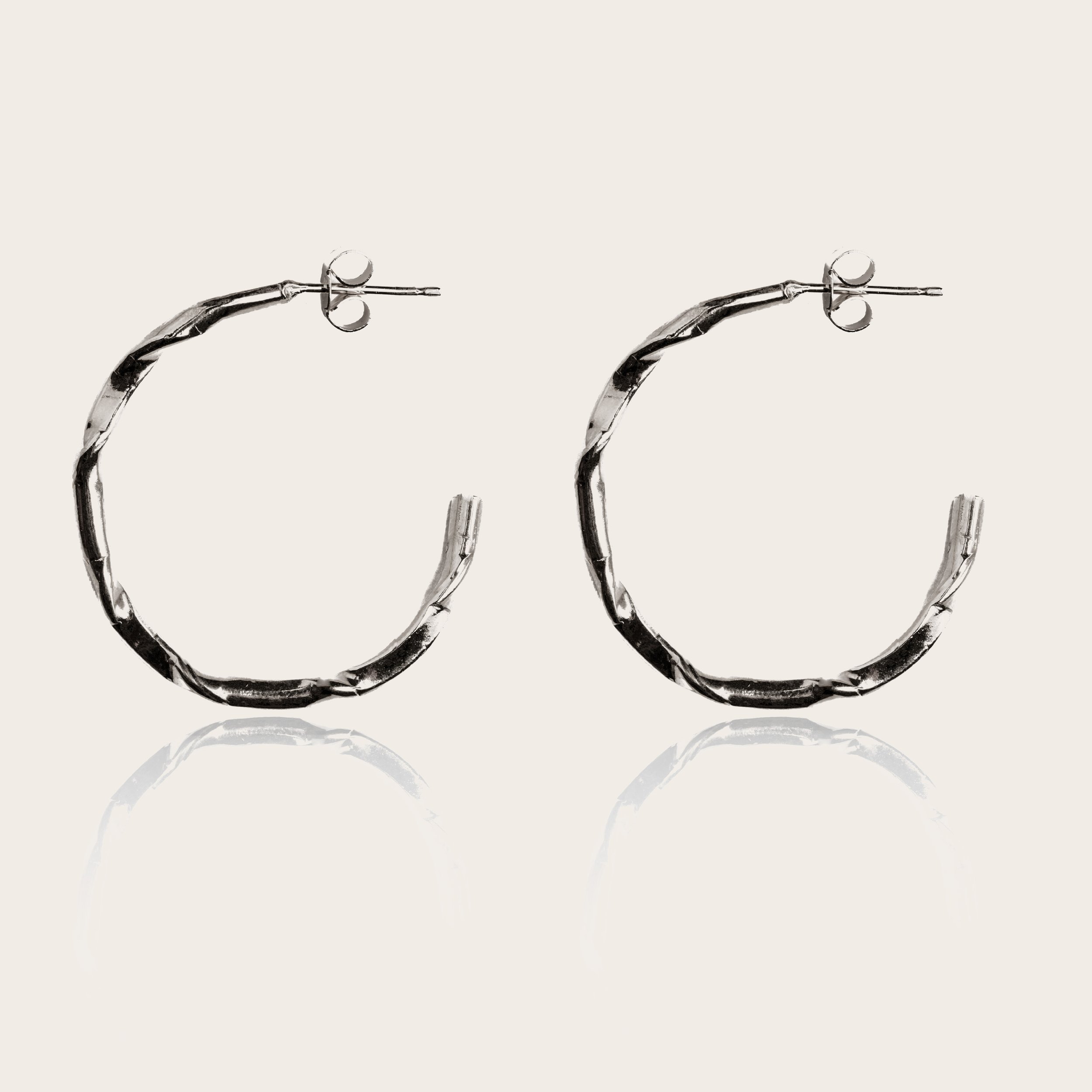 small crumpled hoops silver_ WEBSITE.jpg