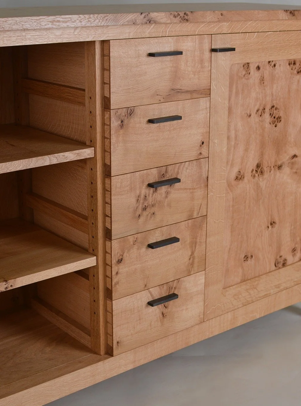 Dovetailed drawers, all cut by hand with saw and chisel, each drawer is then carefully fitted with a handplane. Handles made from a log thats been buried in the peat for 5000 years - Bog oak.

#furnituremaker #dovetails #solidoak