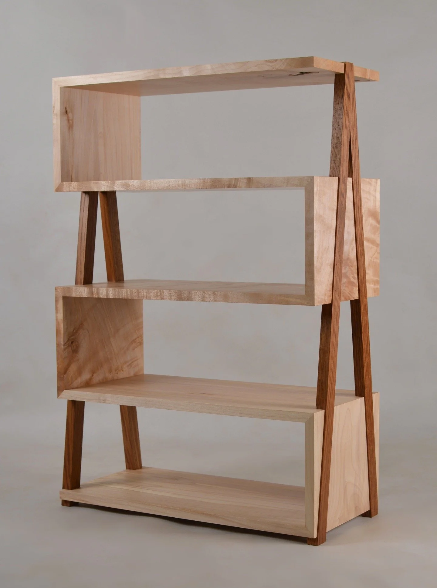 Zigzag bookcase, designed to house a collection of board games.
Scottish sycamore and brown oak. Minimal in appearance but certainly not simple to make.

#bookcase #zigzag #furnituredesign