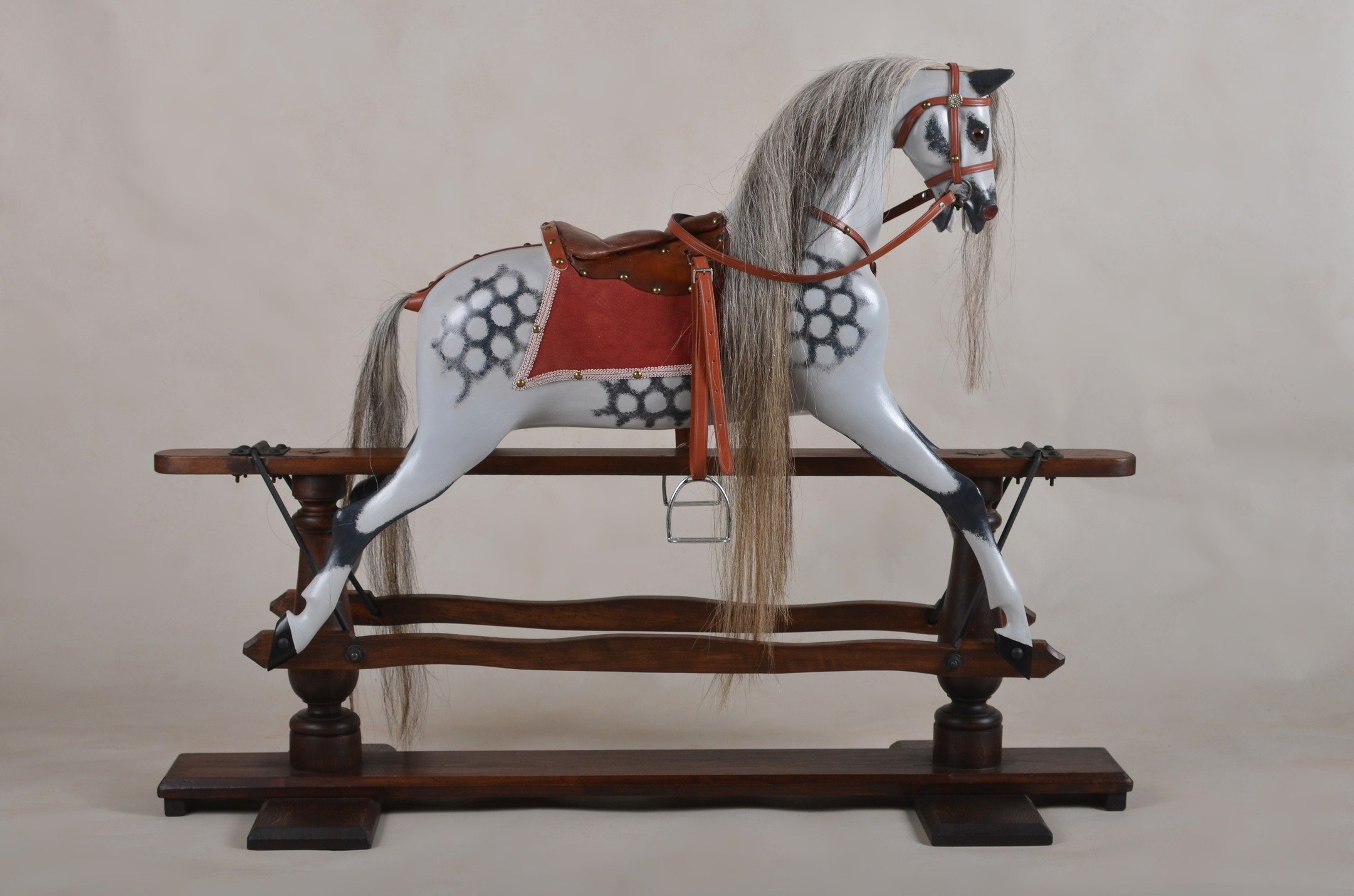 Rocking horse restoration. This came to me in a sorry state, neglected and abandoned in a damp shed for years. Loose leg, broken ear, woodworm. Not my usual line of work, I had to learn a lot about rocking horses.

#rockinghorse #playroom #woodenhors