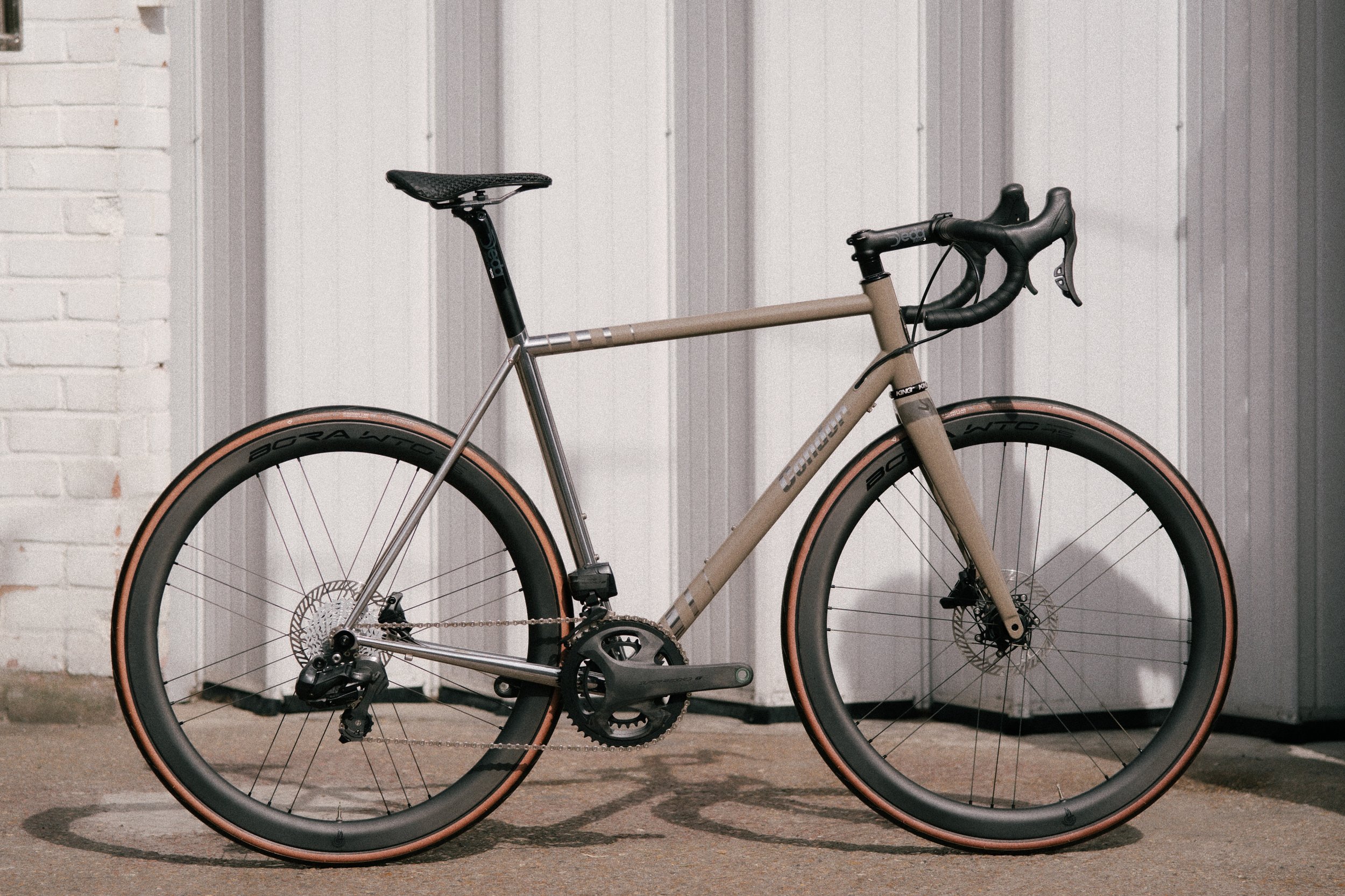 Custom Condor Acciaio Stainless Disc Handmade road bike bespoked uk Deda zero 100 selle italia campagnolo super record bora wto 45 hutchinson black bird