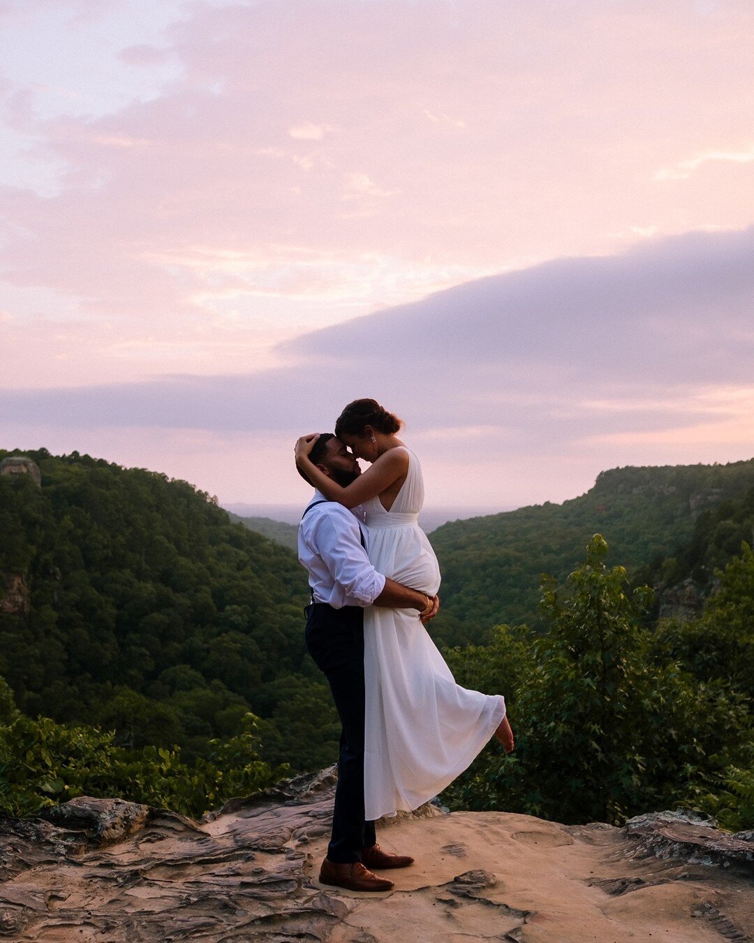 Golden hours always add extra oomph to sessions. Especially in my home state of Arkansas! I mean just look at that view! Head on over to the blog to see more from this session with Jade &amp; Sir Gregory at Petit Jean State Park.
.
#arkansasphotograp