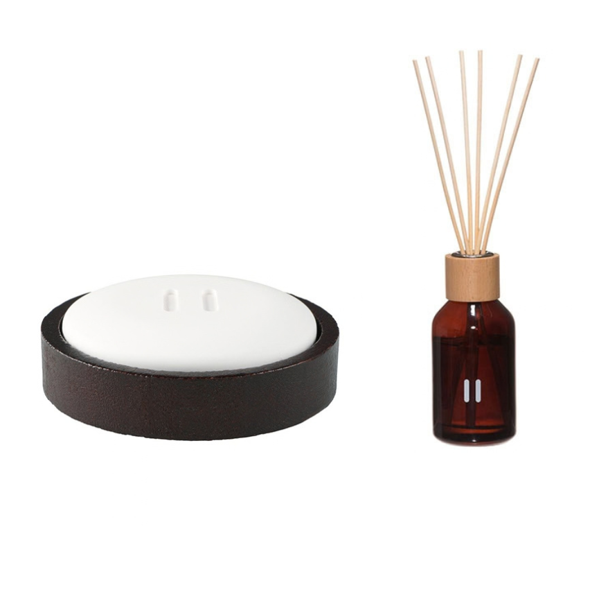 Rento-aroma-diffuser-with-dark-brown-bamboo-tray-and-fragrance-sticks-arctic-berries.png