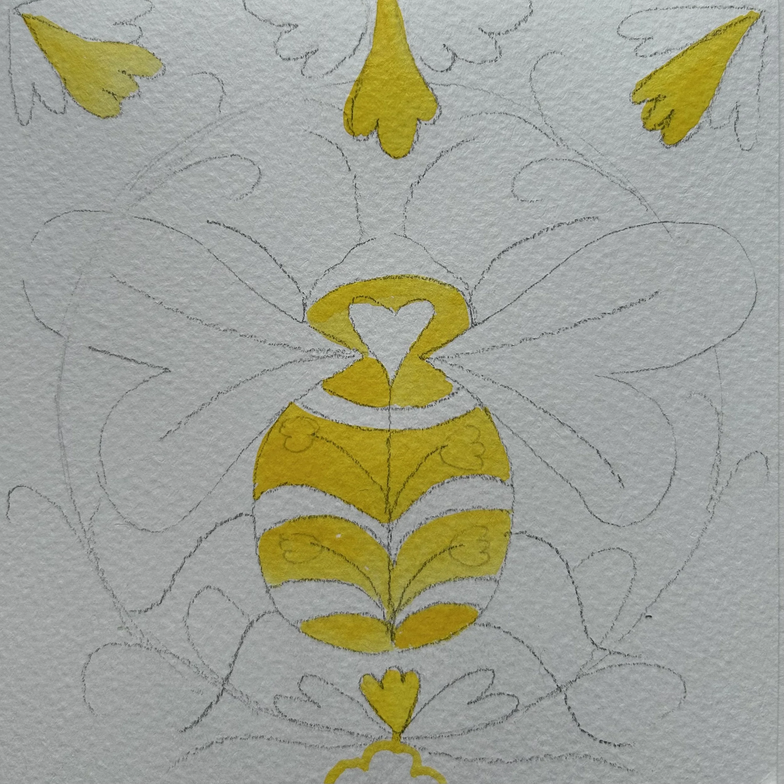 Paint the yellow stripes on the body, the flowers at the top and one at the bottom.