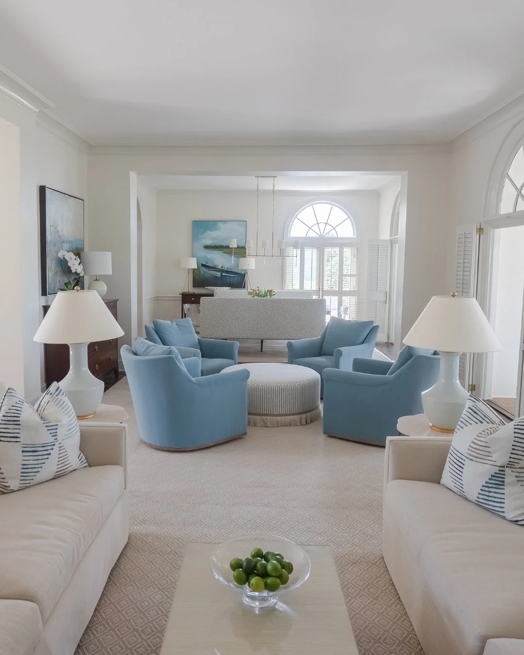Soft blues, classic lines, and plenty of places to land make this room a favorite for gathering and unwinding.⁠
⁠
#wynnepeaceinteriordesign #designinspo #livingroominspo #interiordesign #southernliving #coastalliving