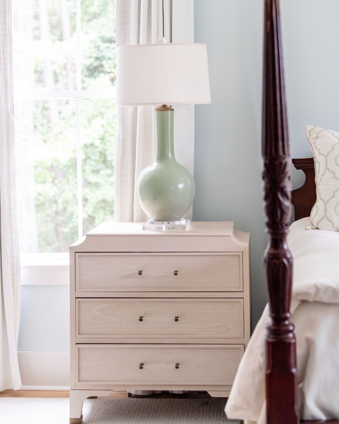 Such a pretty pale blue and green combo in this bedroom, and we love the touch of acrylic in the hardware and lamp. Simple details that really make this space feel pulled together.⁠
⁠
#bedroominspo #wynnepeaceinteriordesign #designinspo #designdetail