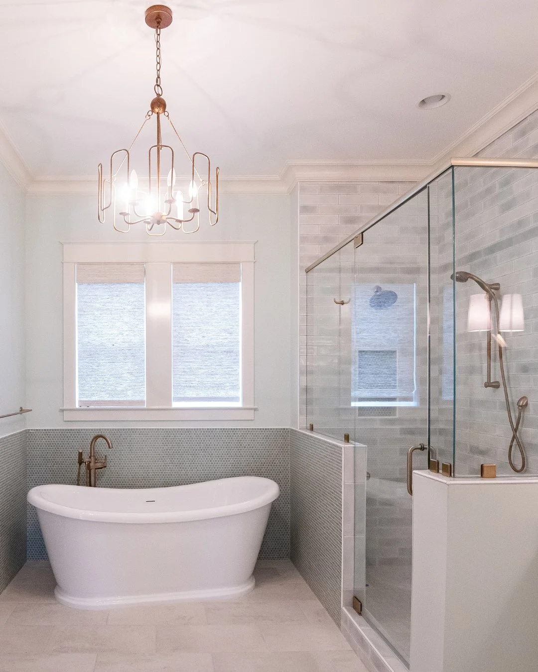 Penny tile appreciation post. We wrapped it around the tub surround and carried it into the shower niche, creating a cohesive, layered look that ties the entire space together.⁠
⁠
#pennytile #wynnepeaceinteriordesign #bathroominspo #bathroomdesign #d