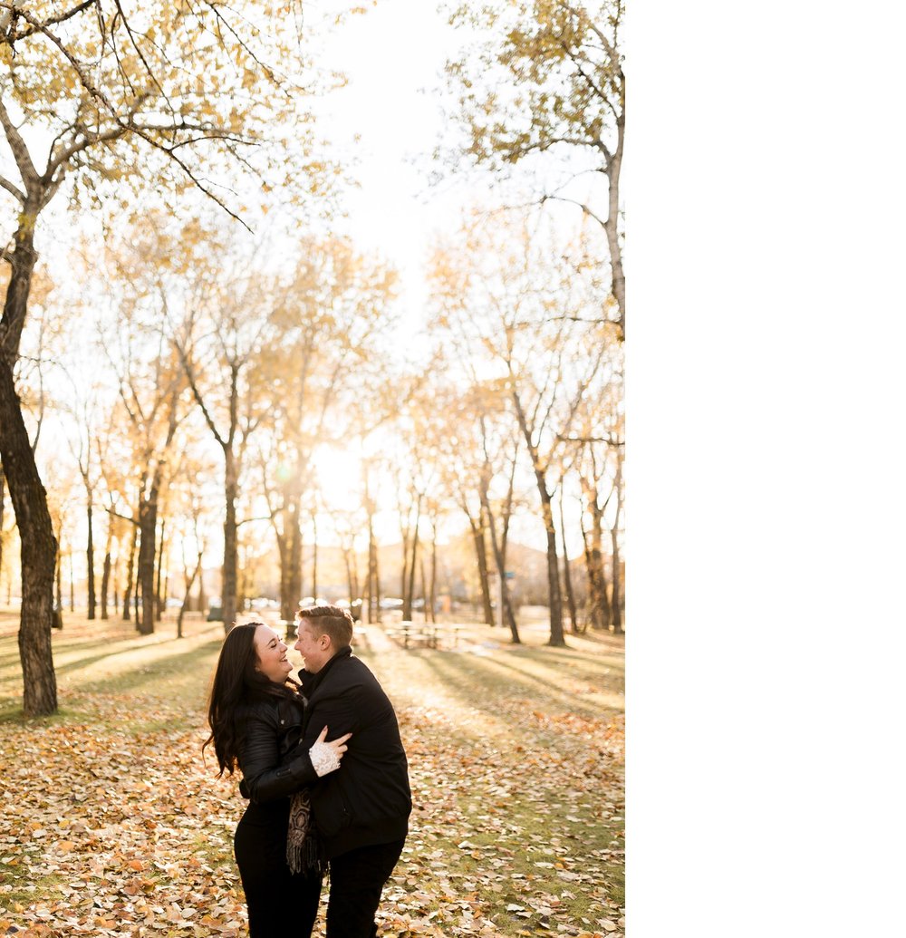 07_2018 29366_sunlight_landscape_trees_couple_engagement_close_Calgary_cuddle_kiss_simple_golden_hour_intimate_nature_autumn_soft_fiancee_delicate_bride_Alberta_photographer_forest_groom_outdoor.jpg