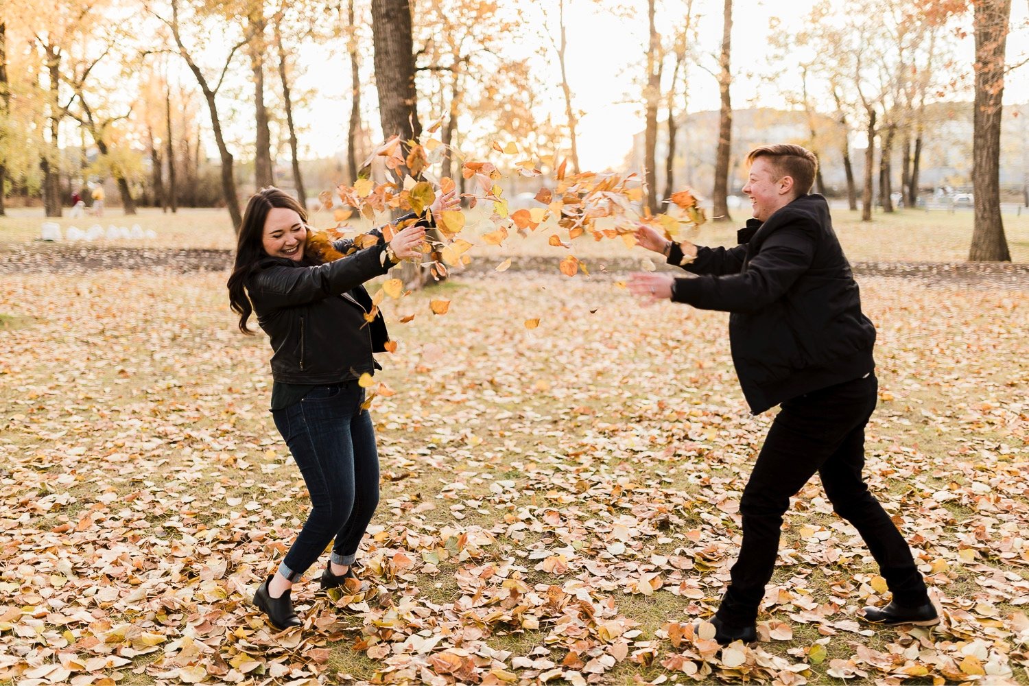13_2018 29496_sunlight_landscape_trees_couple_engagement_close_simple_delicate_cuddle_kiss_golden_nature_intimate_fiancee_autumn_hour_soft_Calgary_bride_Alberta_photographer_forest_groom_outdoor.jpg
