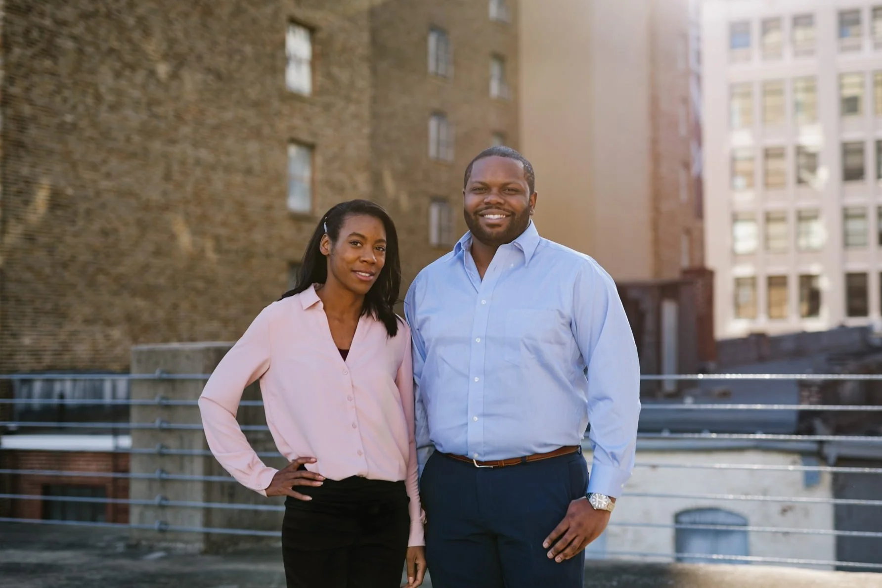 Two founders of a company photographed on a parking garage rooftop in Memphis, Tennessee.