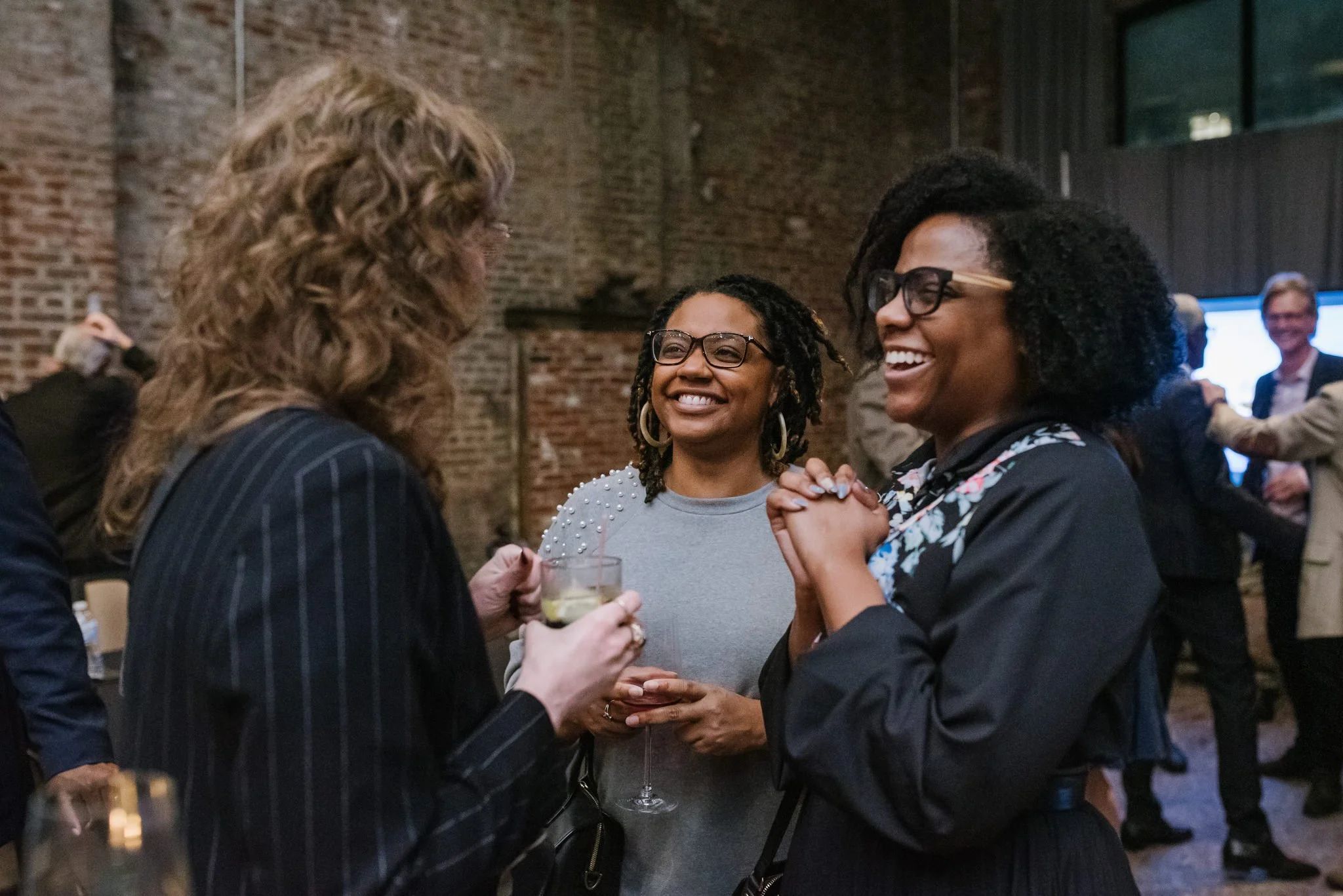 Guests chatting an event for the reveal of the architectural plans for the new Memphis Brooks Museum of Art.