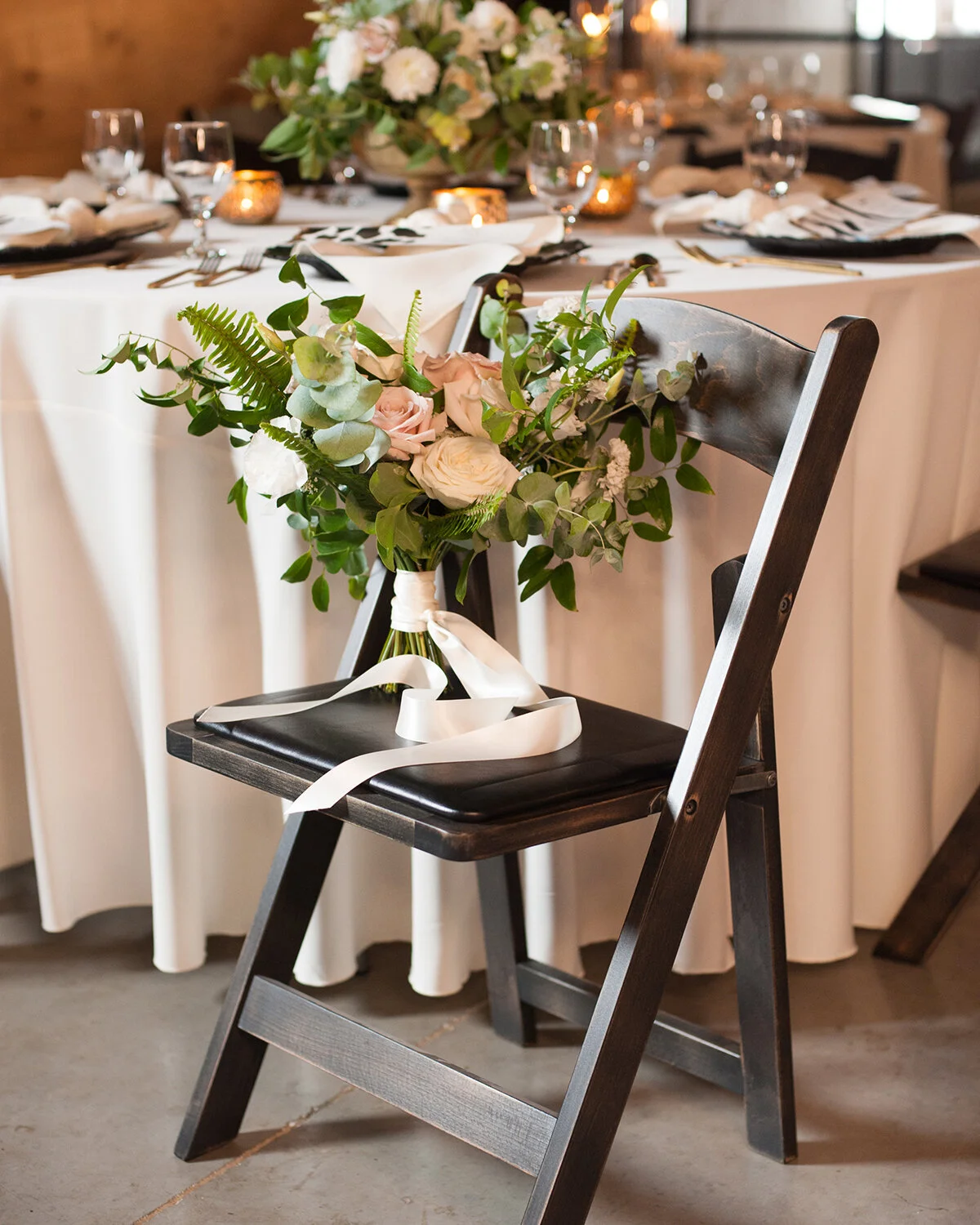 Wedding tablescape featuring The Brightside's included wedding chairs.