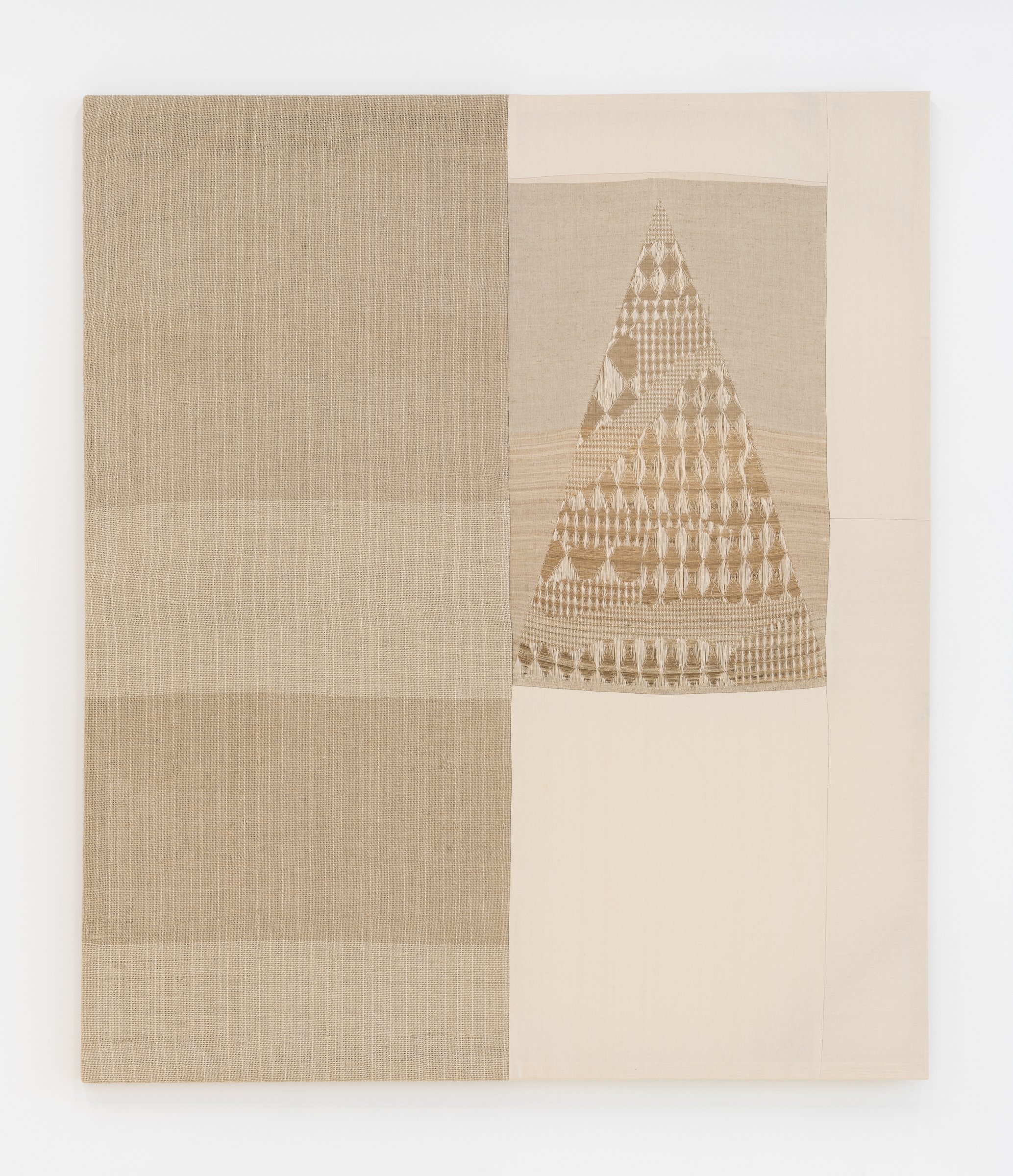 Jovencio de la Paz, Bent Pyramid, 2022. Jacquard textile and cotton, 72 x 84 x 1.5 in (182.88 x 213.36 x 3.81 cm)