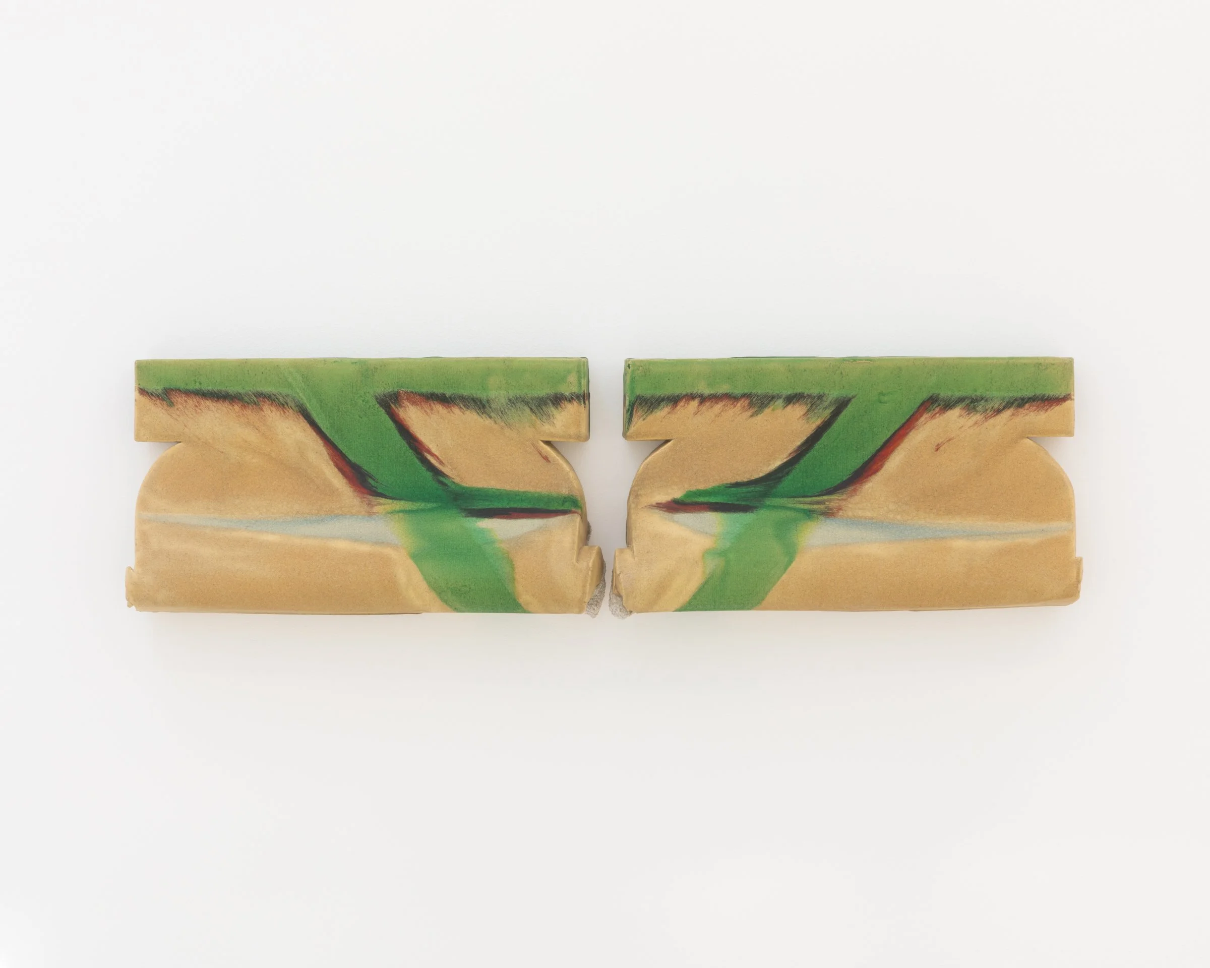 Strix, 2025. Glazed ceramic, 9 x 36 x 4 in (22.9 x 91.4 x 10.2 cm)