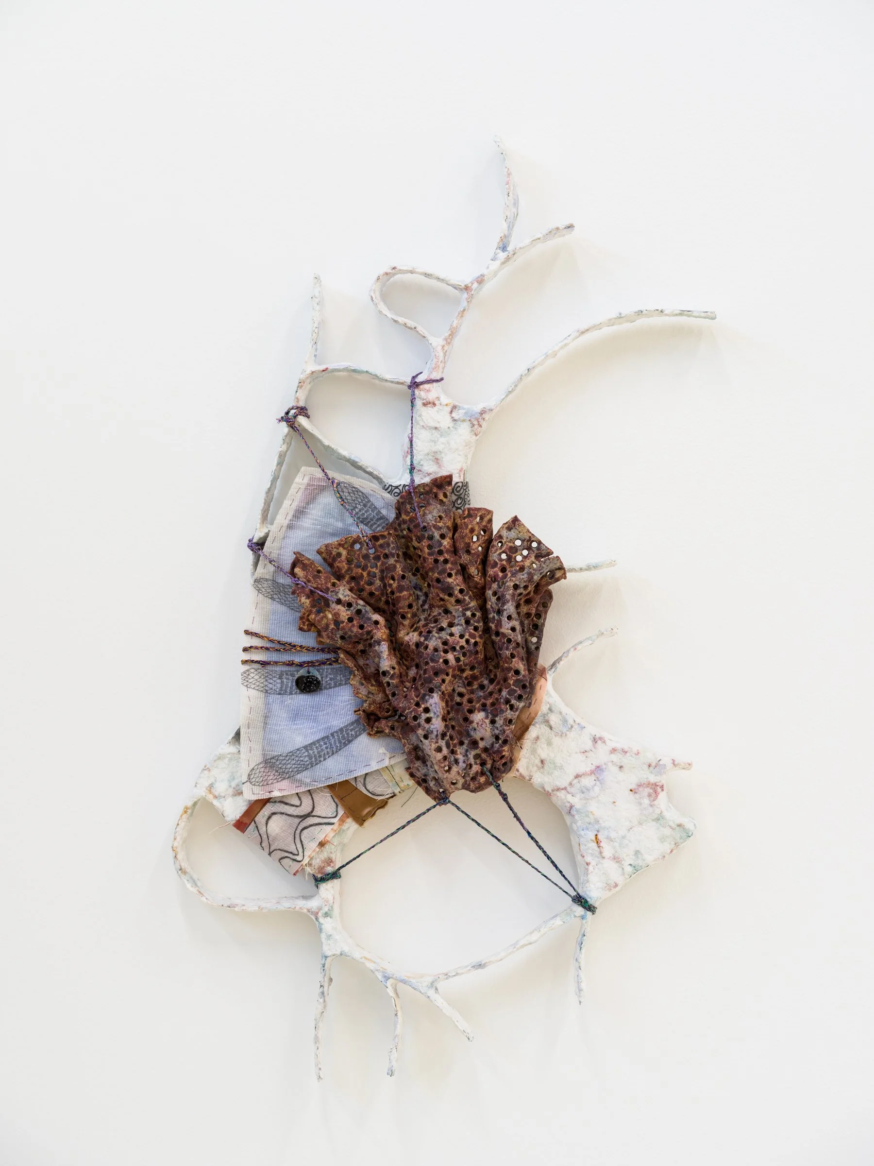 Codex 36, 2023. Paper maché, wire, glazed ceramic, yarn, transparent paper, paper, graphite, charcoal, watercolor, muslin, hand dyed fabric, hand made cords, 23 x 18 x 4 in (58.42 x 45.72 x 10.16 cm).