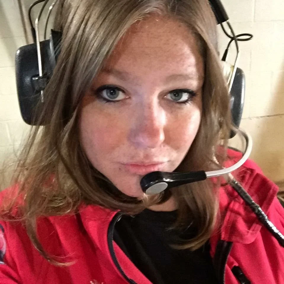 Alanna L. Wade wearing a communications headset