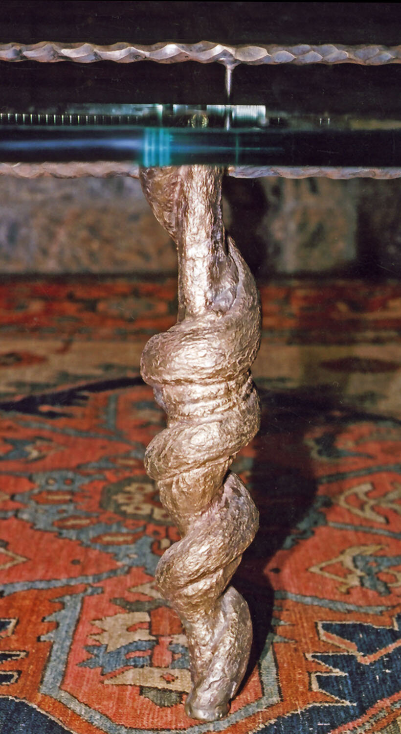 Bronze table with cast bronze leg