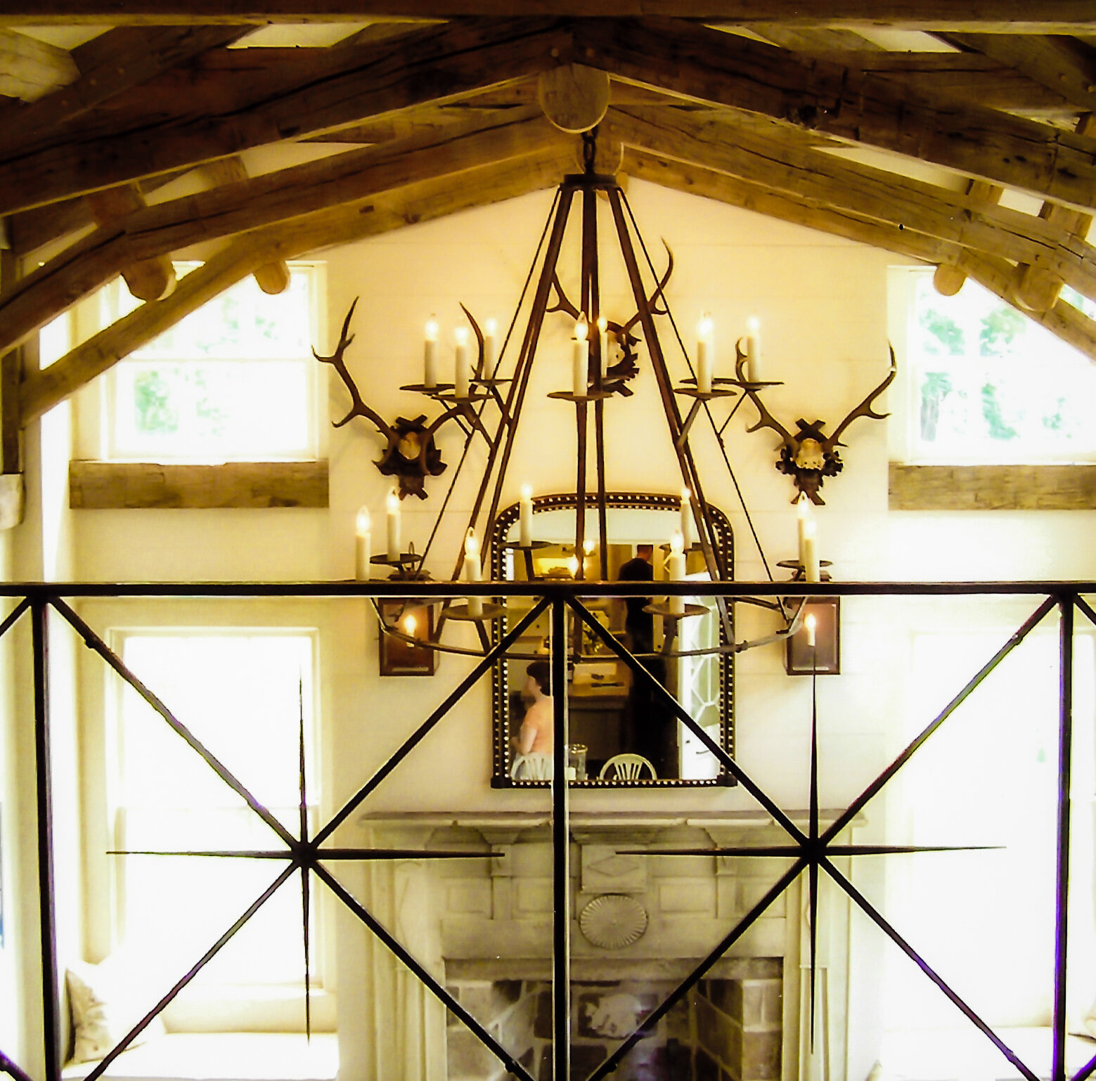 Modern wrought iron railing and chandelier