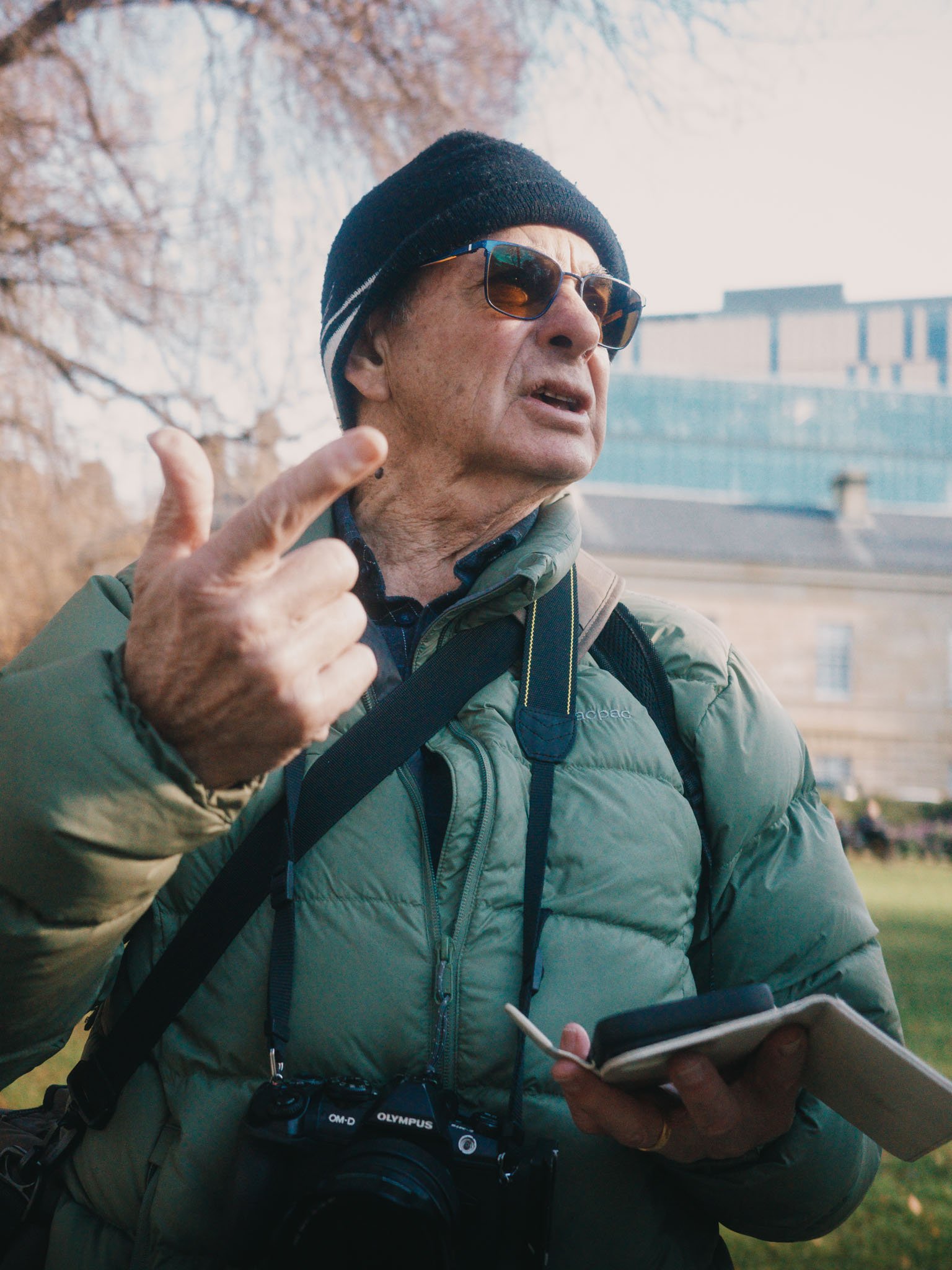 Emanuel explaining to Rob how it's his turn to shout us for breakfast.