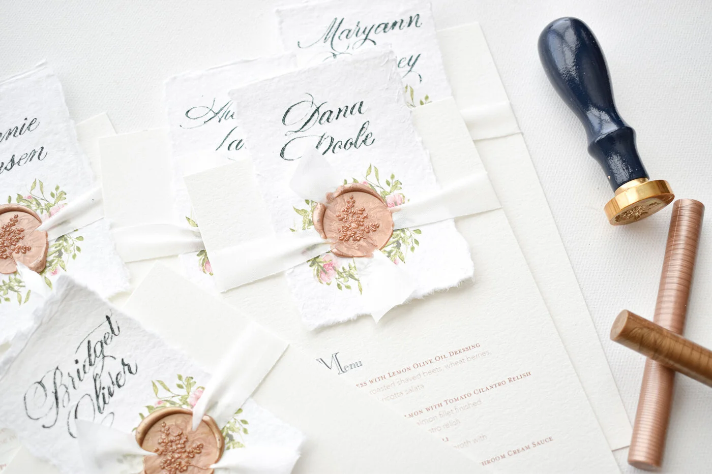 custom-wax-seal-menus-handmade-paper-placecard-attached.jpg