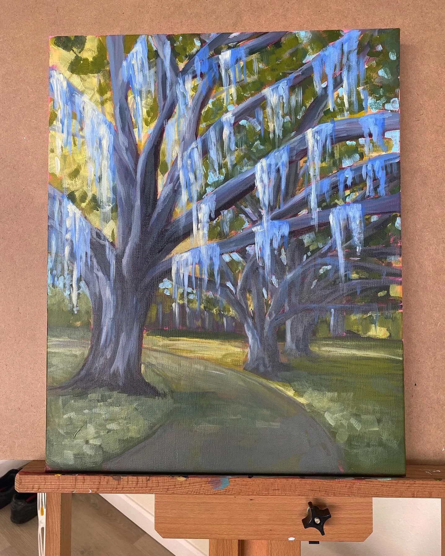 Swipe left to see the journey of my latest acrylic work of art including the photo that inspired it all. 🌿🌳 From a blank canvas covered in magenta to a vibrant depiction of the mossy trees near my home, I'm thrilled to share the progress of this pa