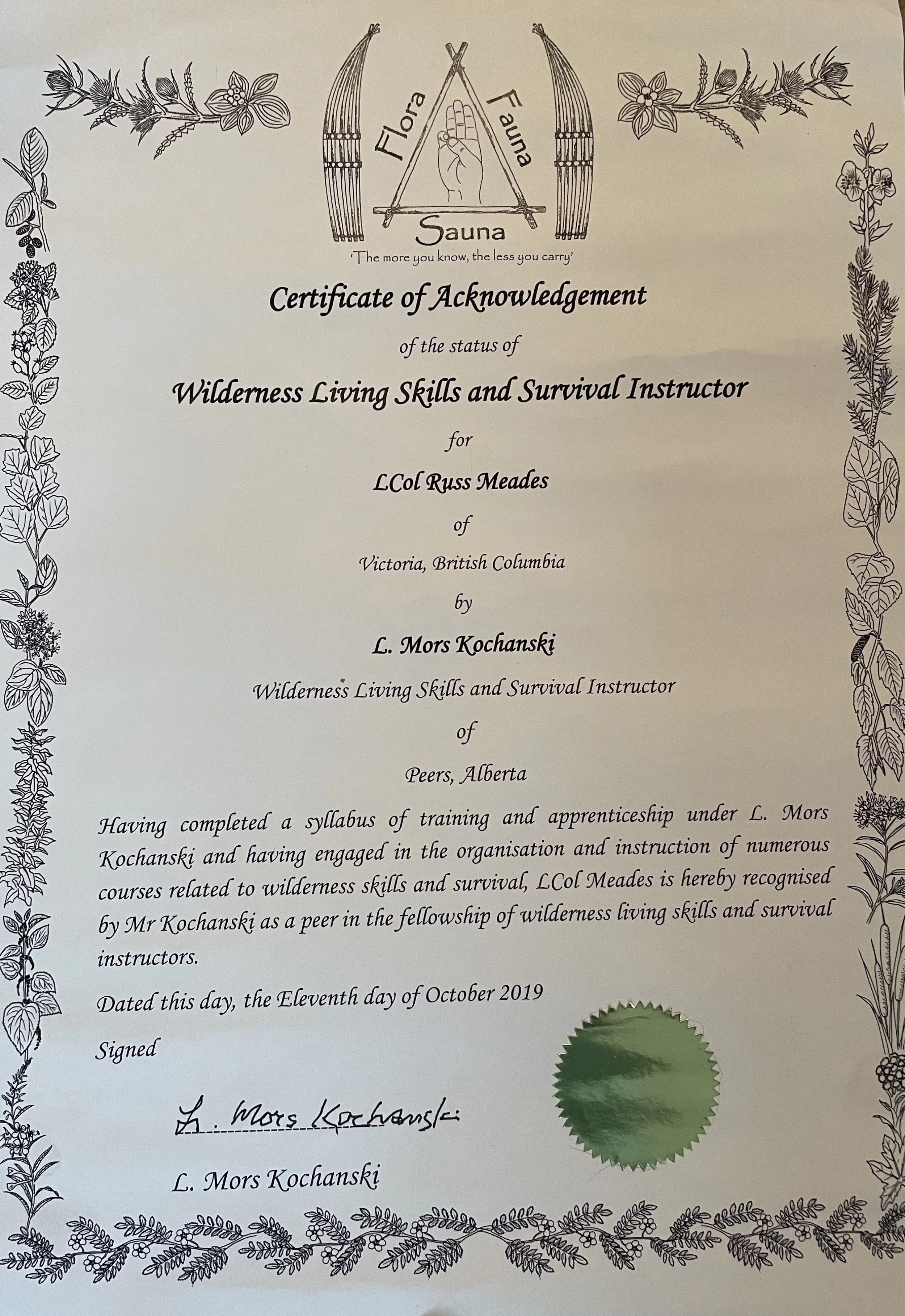 Certificate of Acknowledgement awarded by L. Mors Kochanski, recognizing the status of Lieutenant Colonel Russ Meades as a fellow Wilderness Living Skills and Survival Instructor.