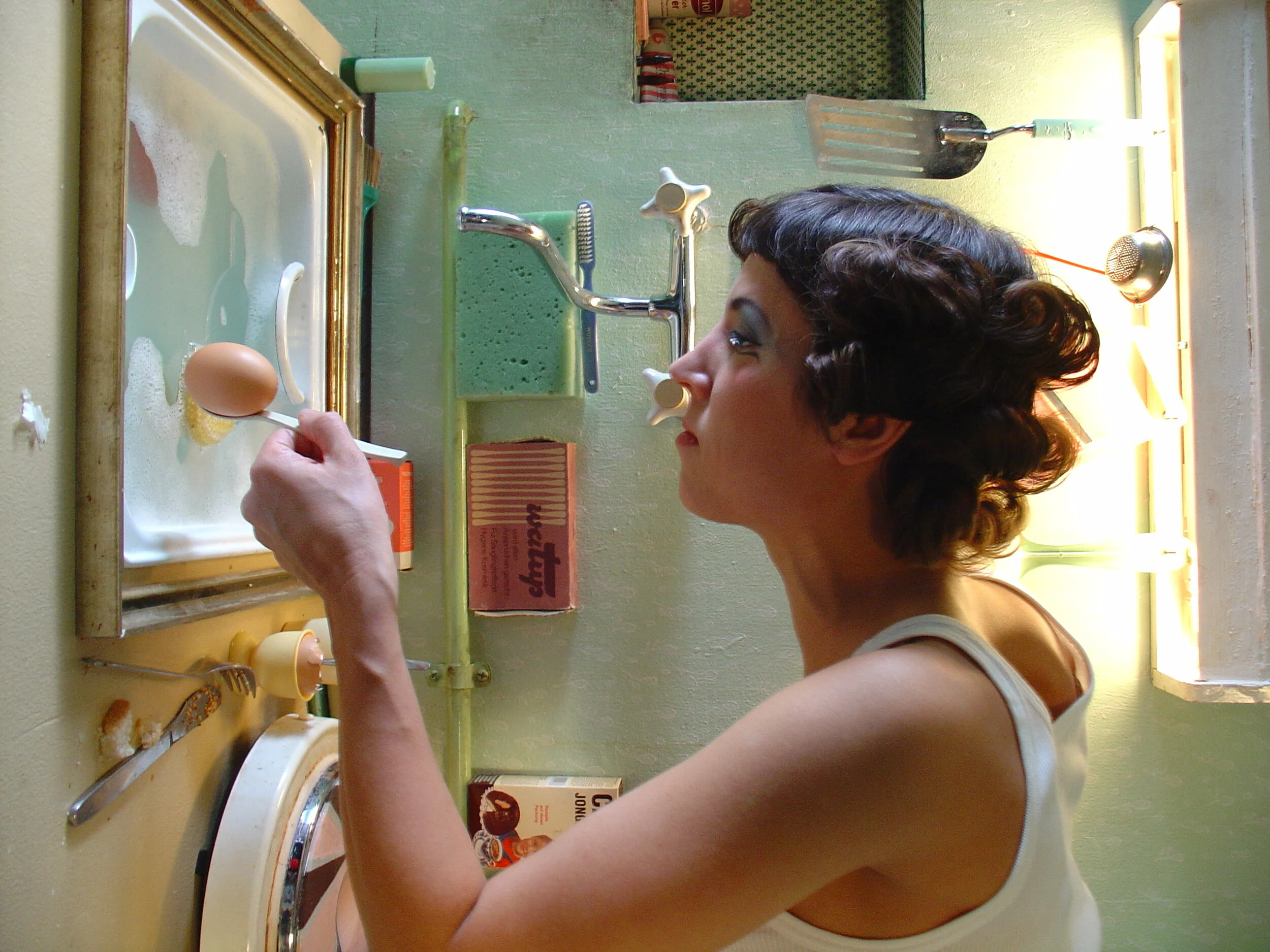  FLOOR TURNS TO WALL, METAMORPHOSE FROM A SINK TO A MURAL IN A FRAME 