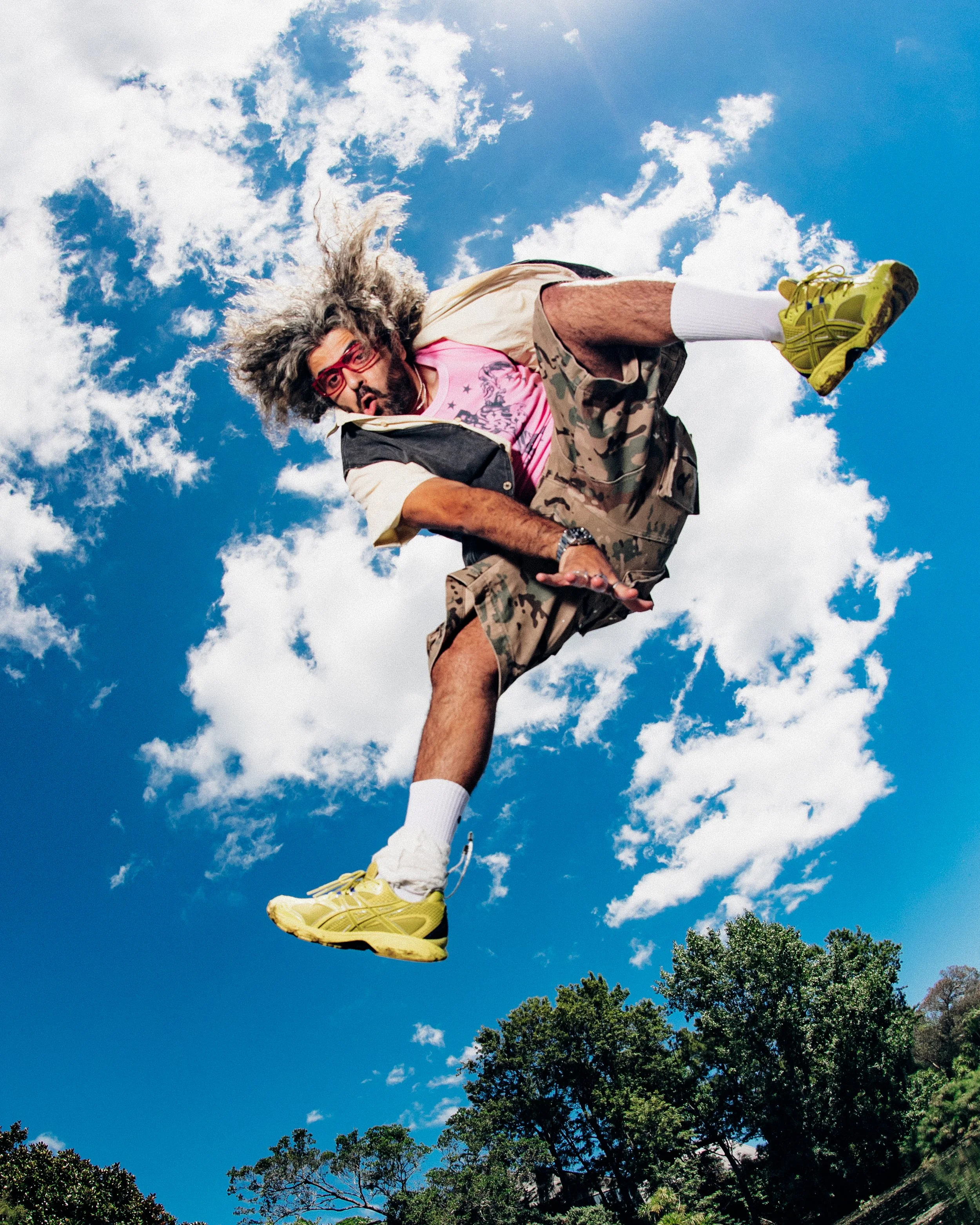   Glasses: Flatlist, Baby Tee: Nineteen99, Jorts: Ksubi, Shoes: Asics, Rings: Stolen Girlfriends Club  