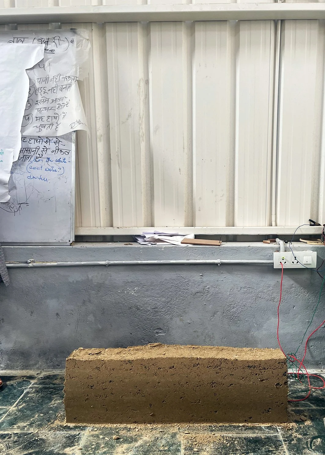 dhun_experiment_rammedearth_wall.jpg