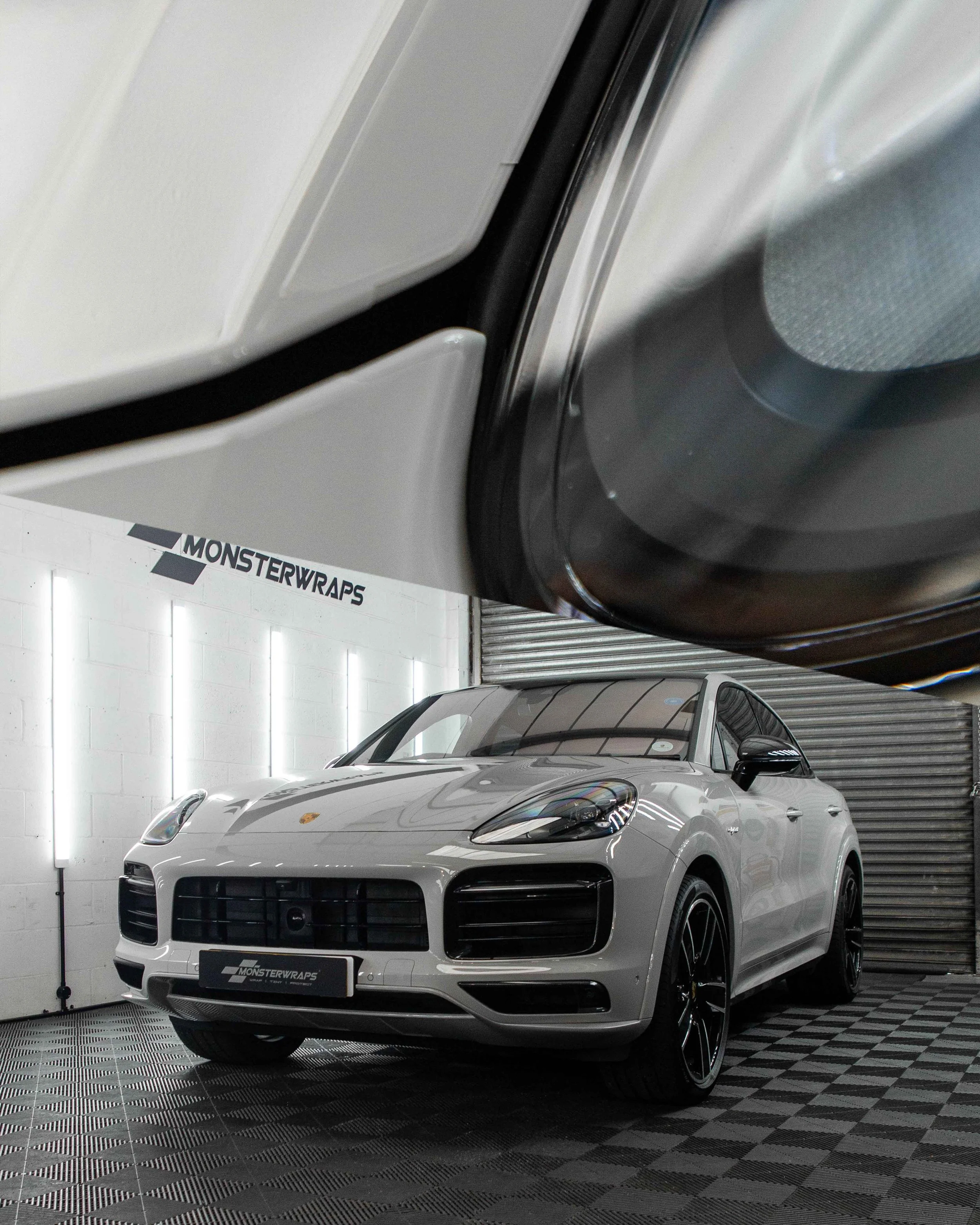 Porsche Cayenne Bonnet, front bumper, headlights and Carbon trims all wrapped and protected with Gloss Paint Protection Film.