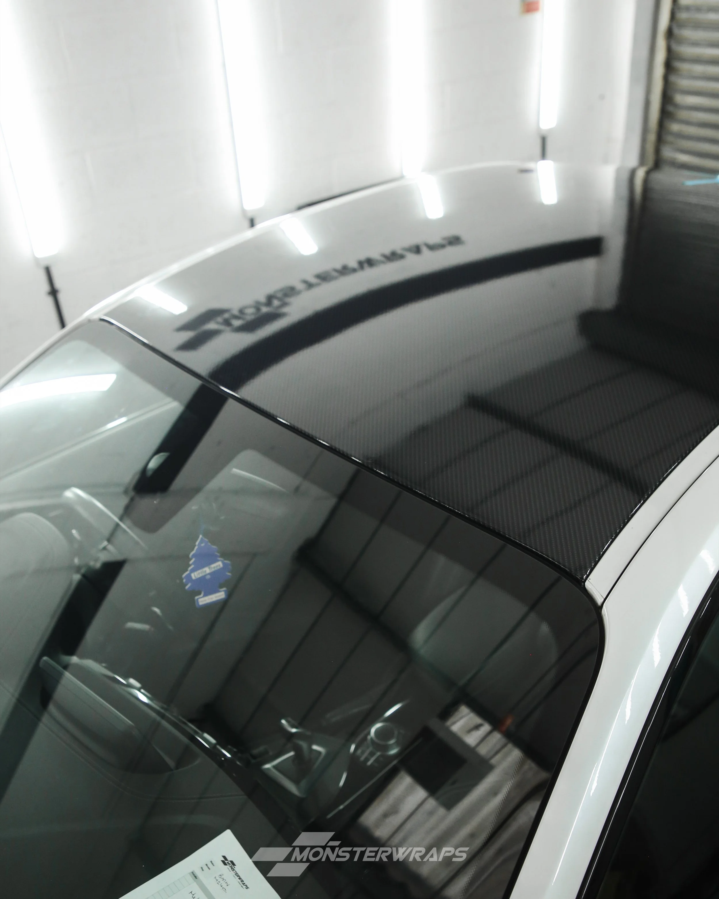 bmw 2 series m performance M240i F22 roof wrapped in 3M high gloss carbon fiber wrapping film