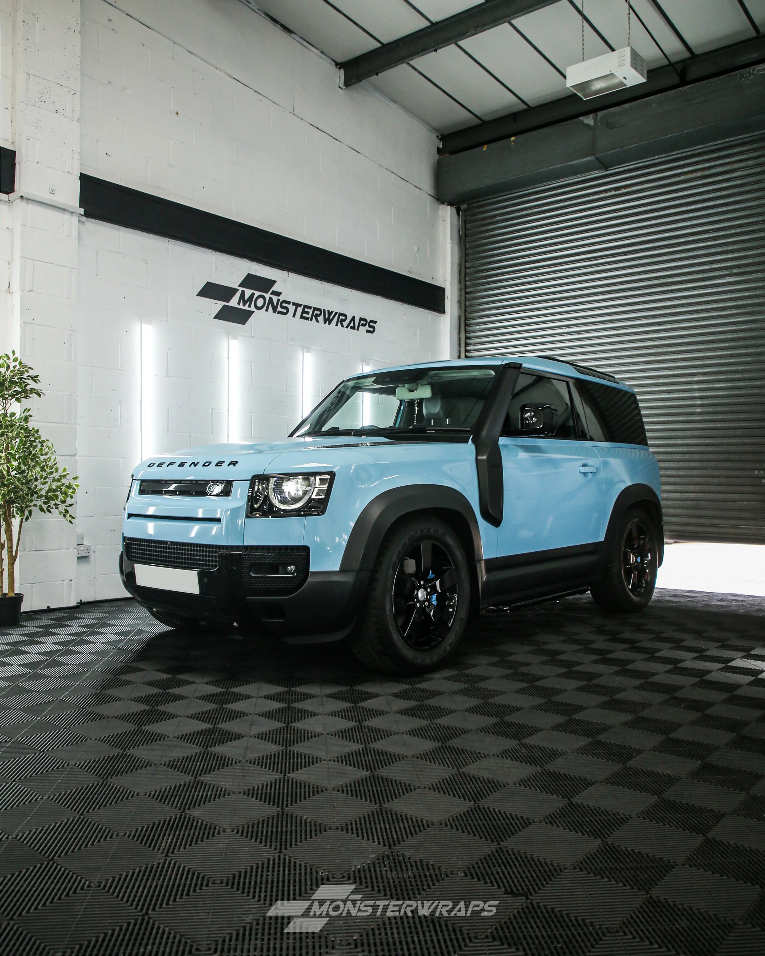Land Rover Defender 90 full colour change vinyl wrap including door shuts and returns in Avery Dennison Gloss Sea Breeze