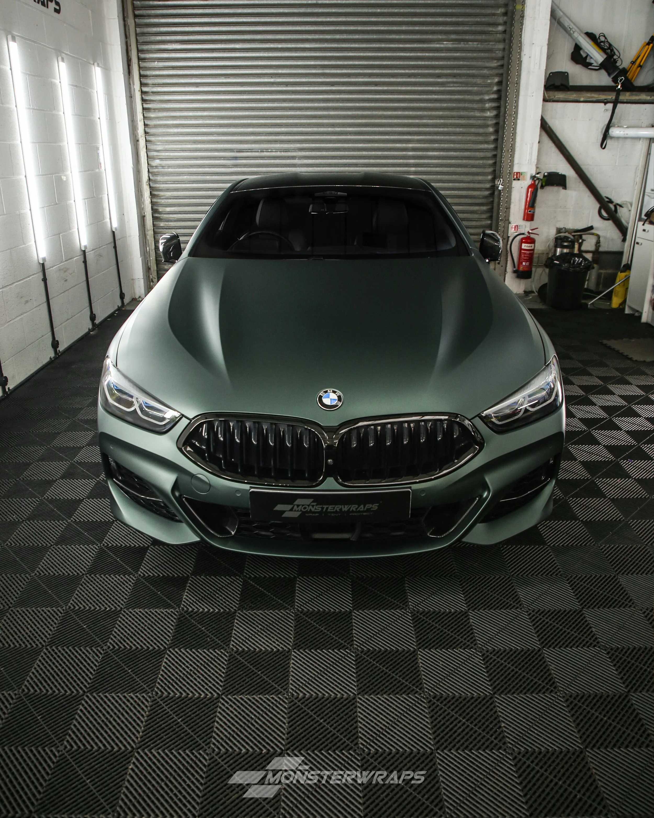 BMW 8 Series M850i wrapped in 3M Matte Pine Green Metallic
