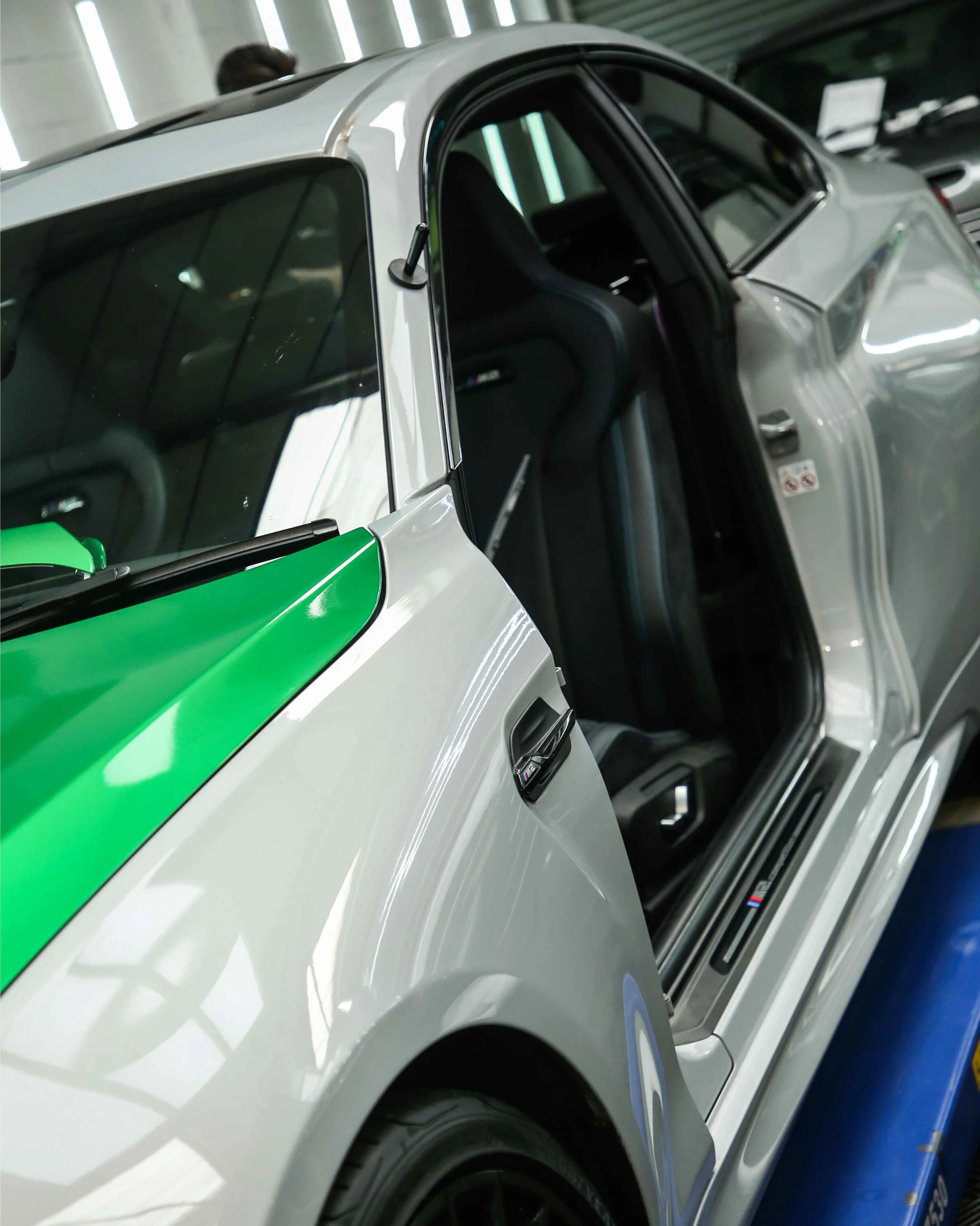 BMW M2 Competition F87 full colour change vinyl wrap in 3M Gloss Green Envy